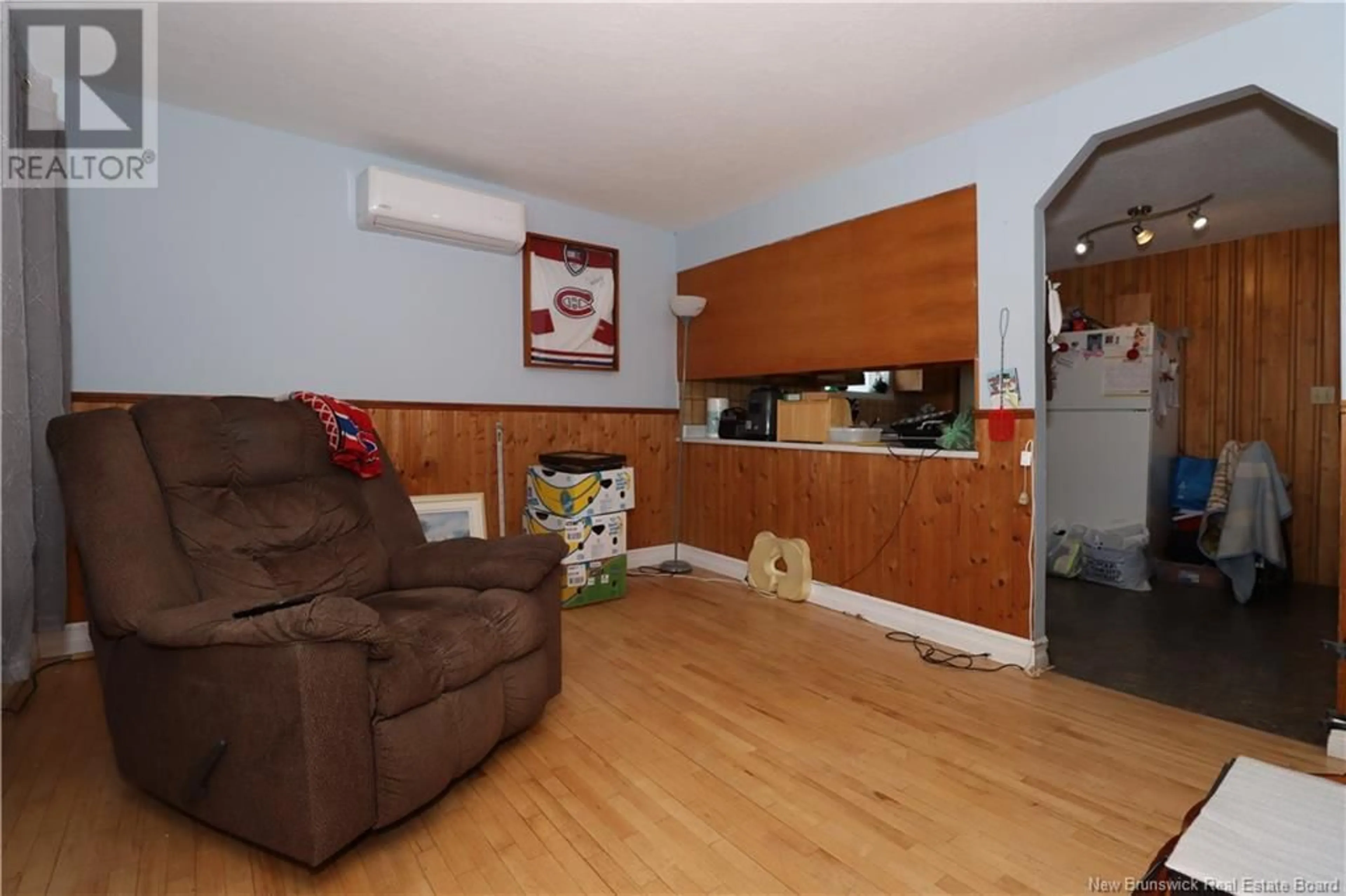 Living room with furniture, wood/laminate floor for 250 HIGHLANDVIEW ROAD, Moncton New Brunswick E1A2L3