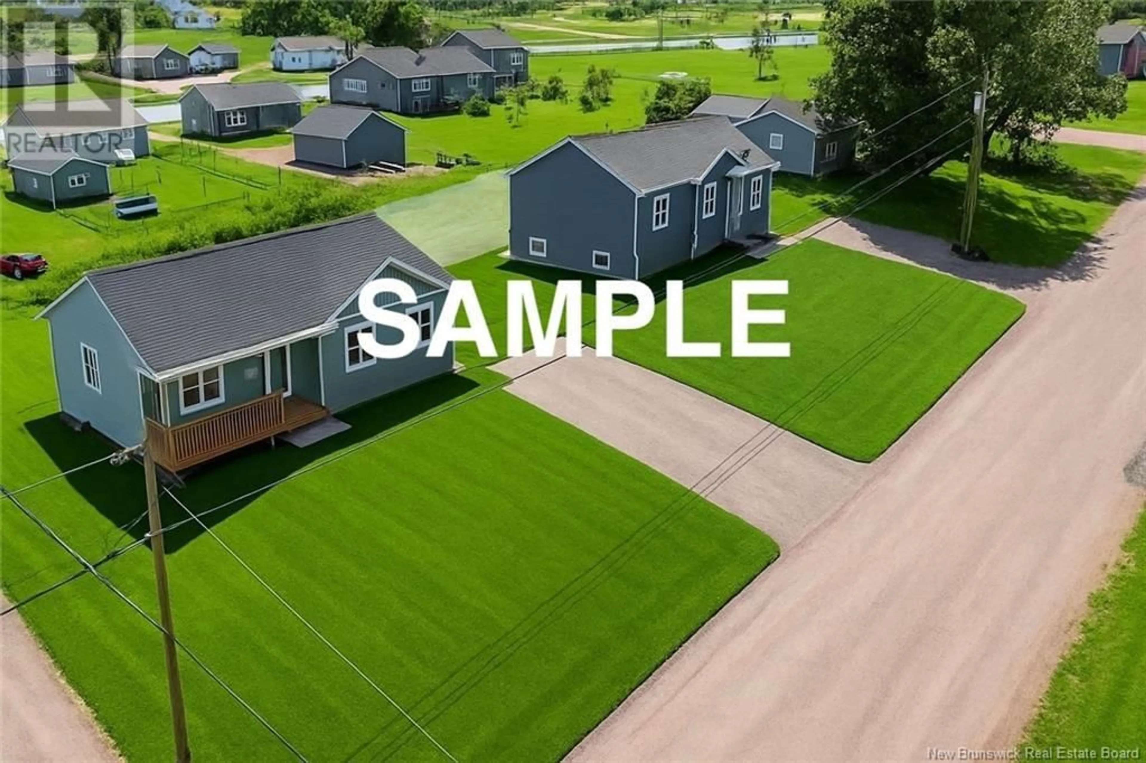 A pic from outside/outdoor area/front of a property/back of a property/a pic from drone, street for 133 DUCHARME STREET, Memramcook New Brunswick E4K2G2