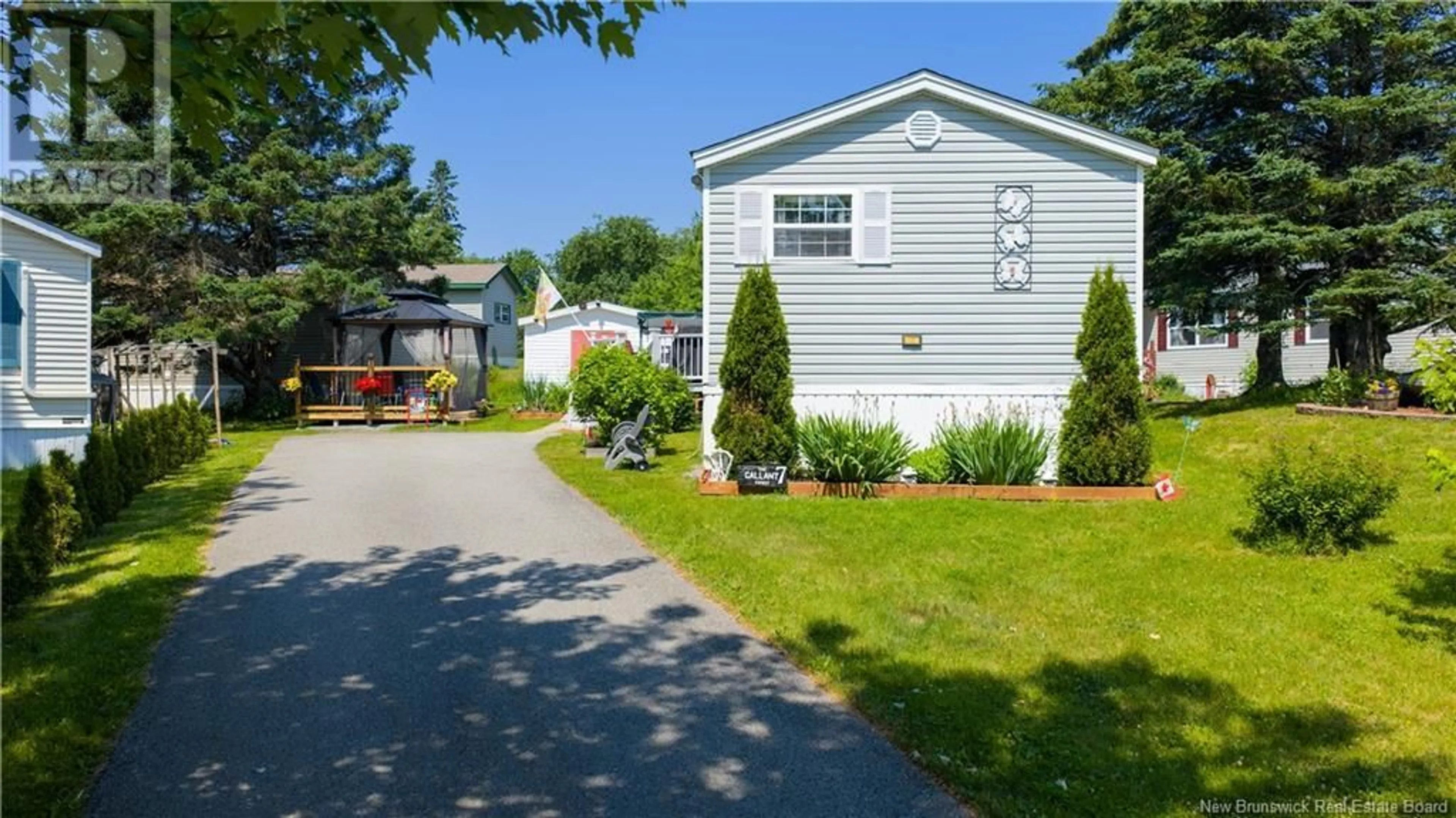 Home with vinyl exterior material, street for 7 SITKA LANE, Quispamsis New Brunswick E2G1W9