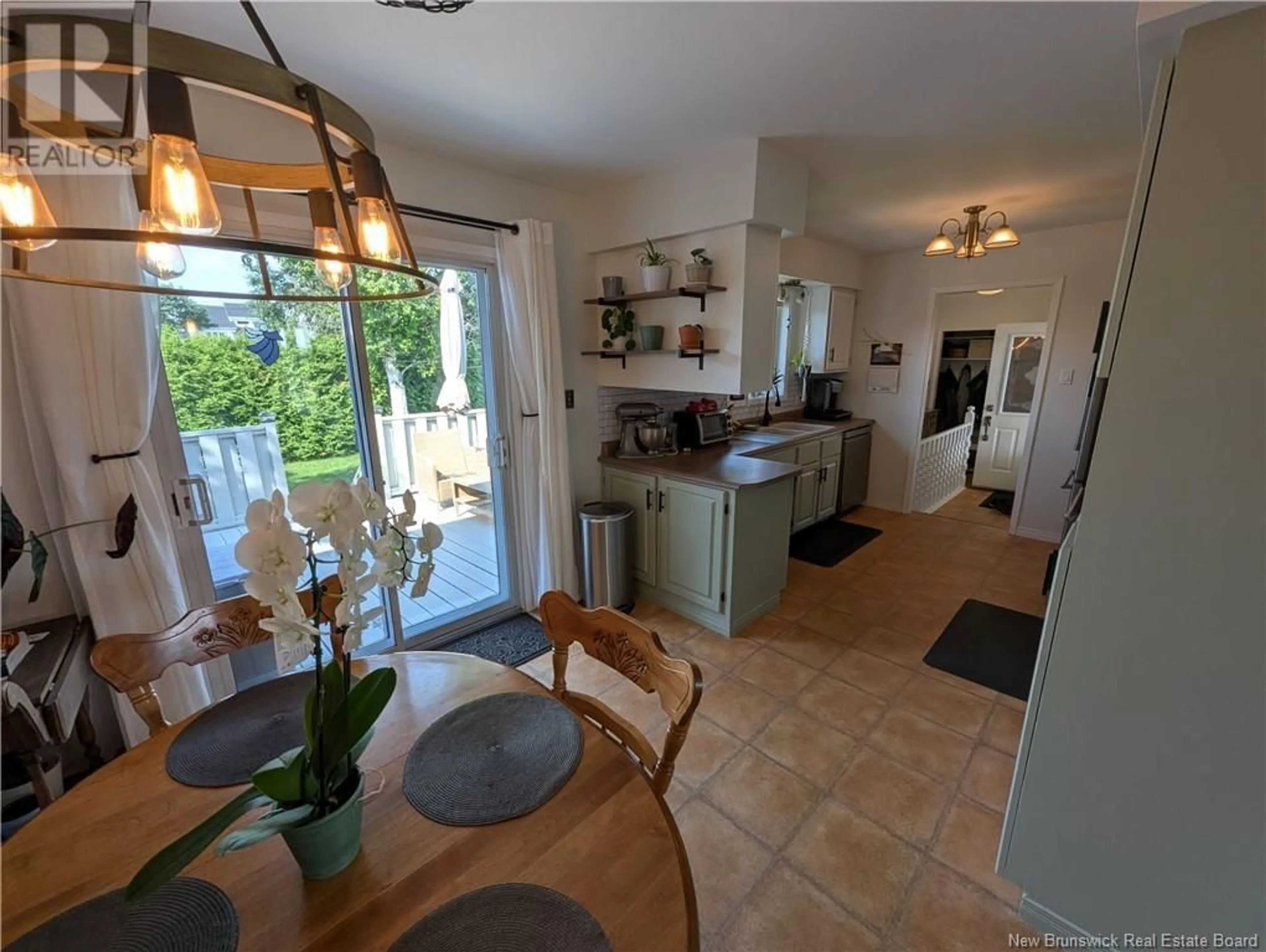 Open concept kitchen, ceramic/tile floor for 1175 OCEAN RIDGE, Bathurst New Brunswick E2A4R8