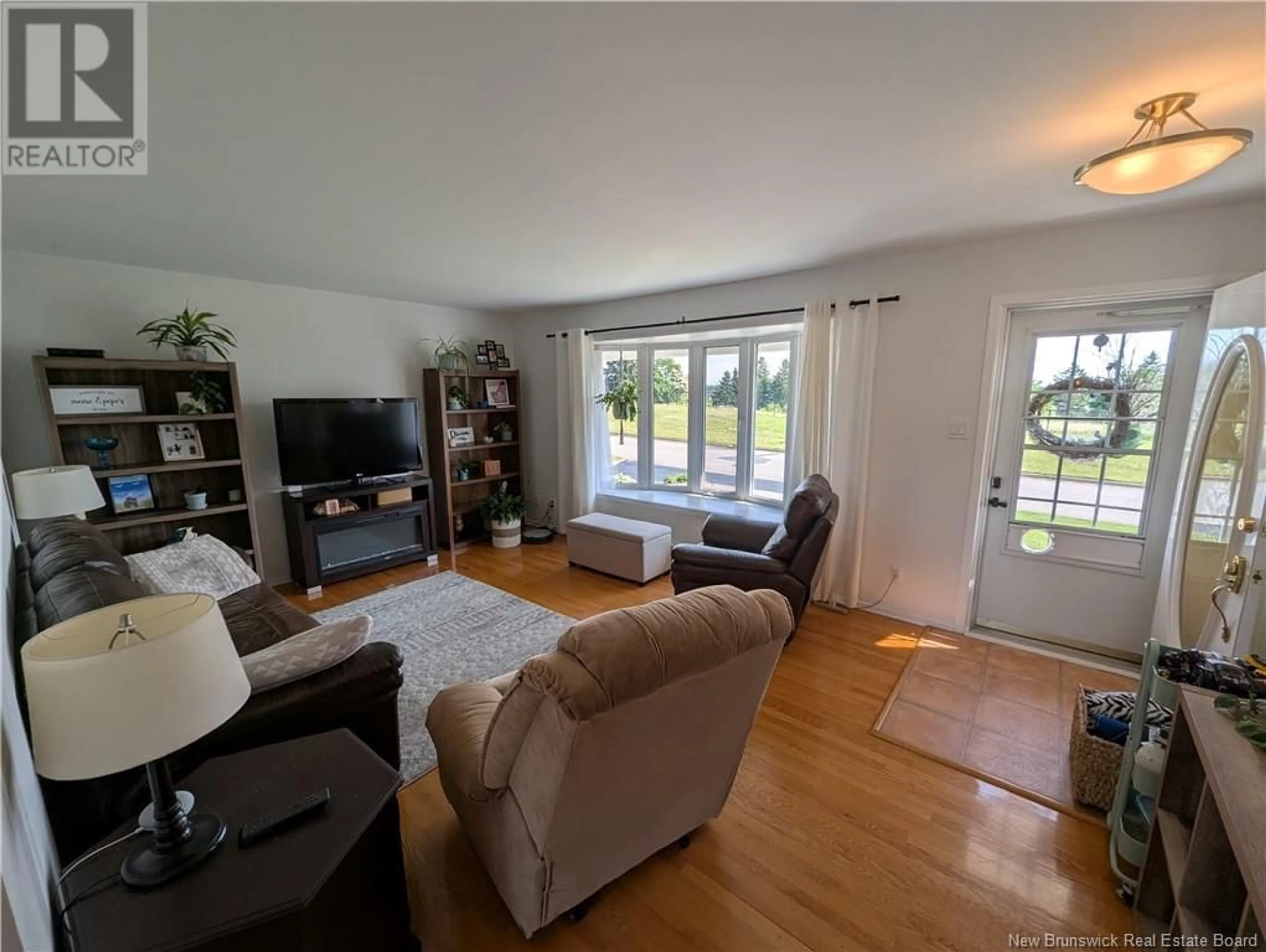 Living room with furniture, unknown for 1175 OCEAN RIDGE, Bathurst New Brunswick E2A4R8