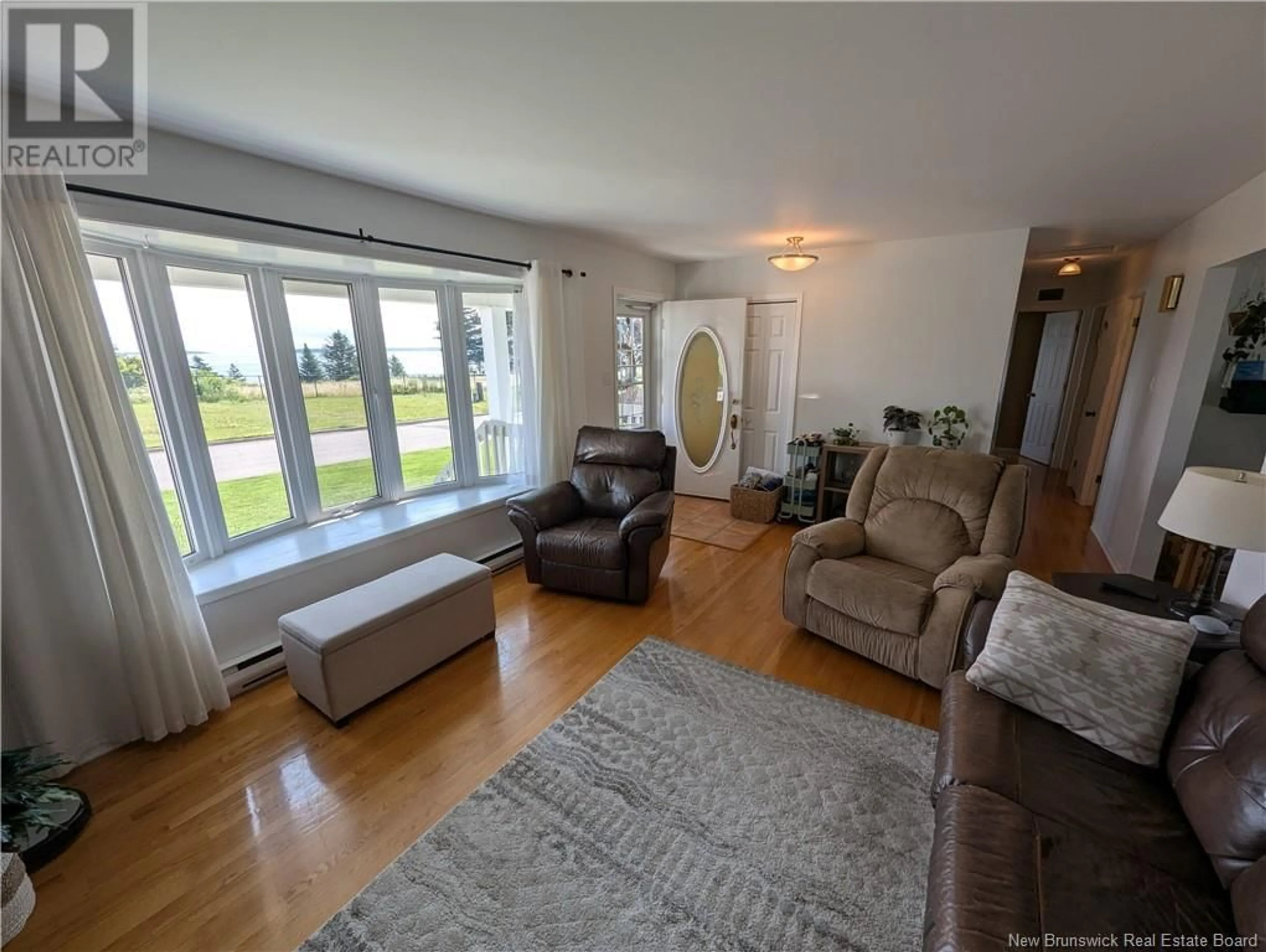 Living room with furniture, unknown for 1175 OCEAN RIDGE, Bathurst New Brunswick E2A4R8
