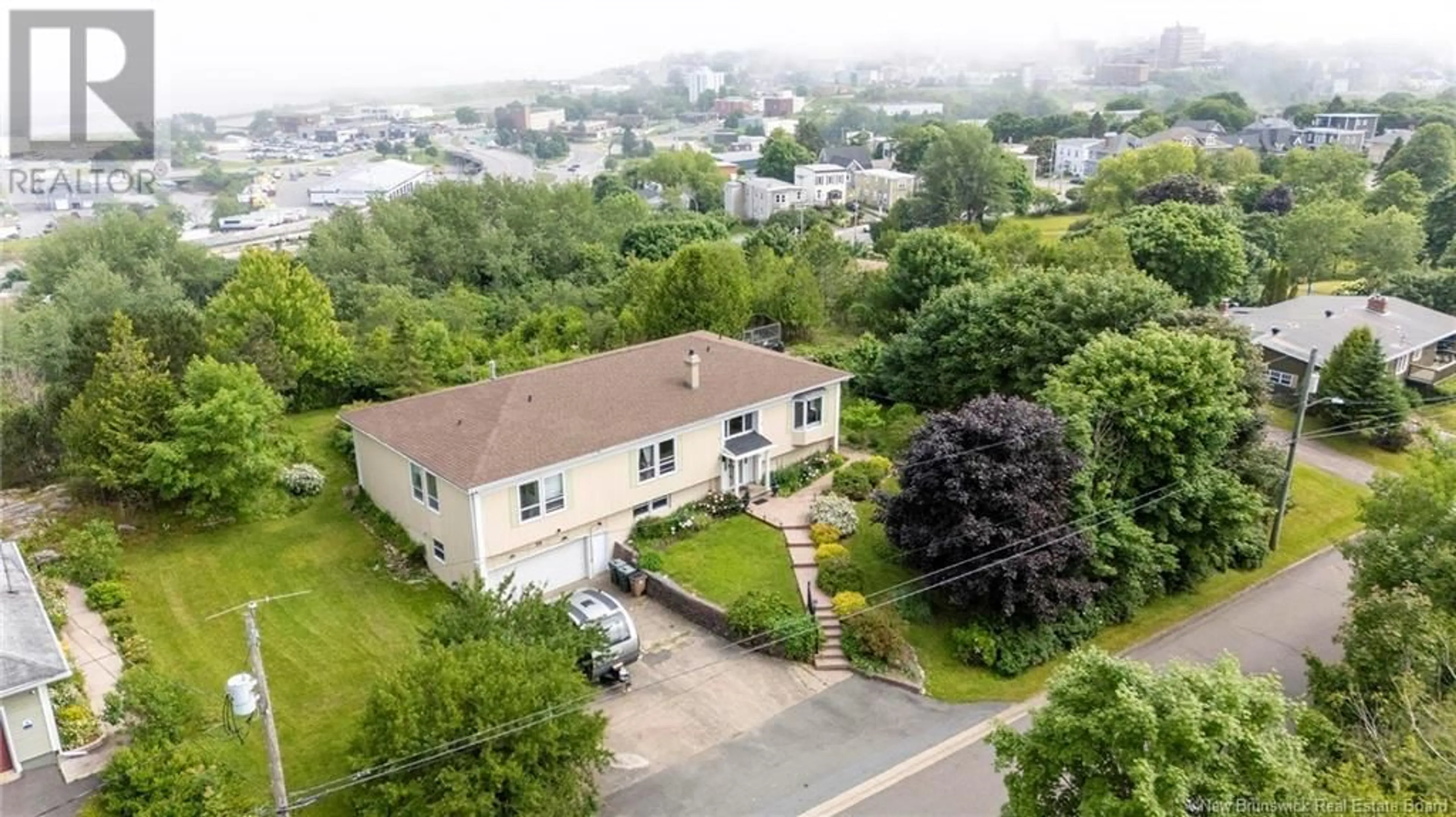 A pic from outside/outdoor area/front of a property/back of a property/a pic from drone, unknown for 26 HIGHWOOD DRIVE, Saint John New Brunswick E2K4B7