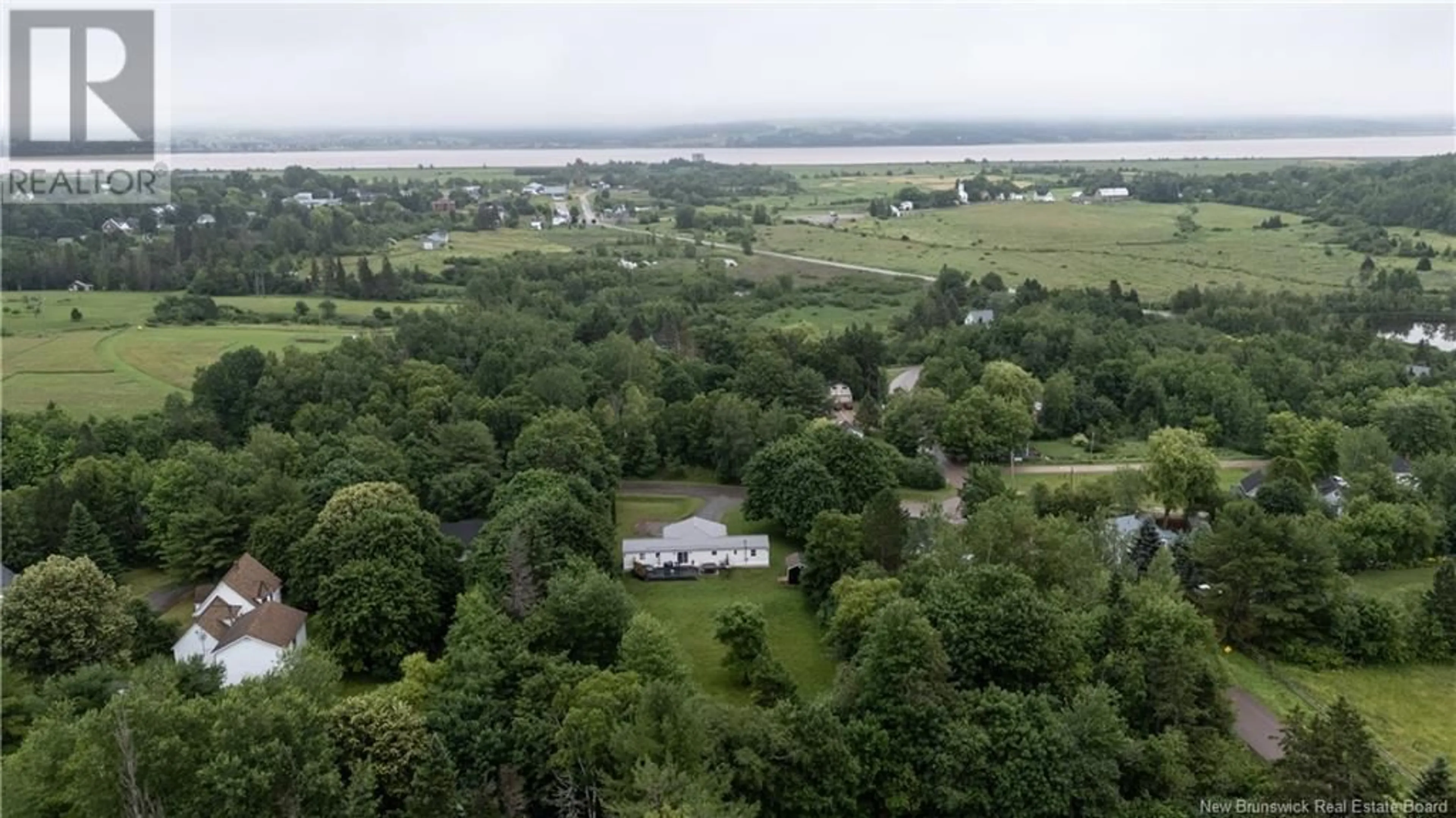 A pic from outside/outdoor area/front of a property/back of a property/a pic from drone, water/lake/river/ocean view for 211 PLEASANT STREET, Hillsborough New Brunswick E4H3B2