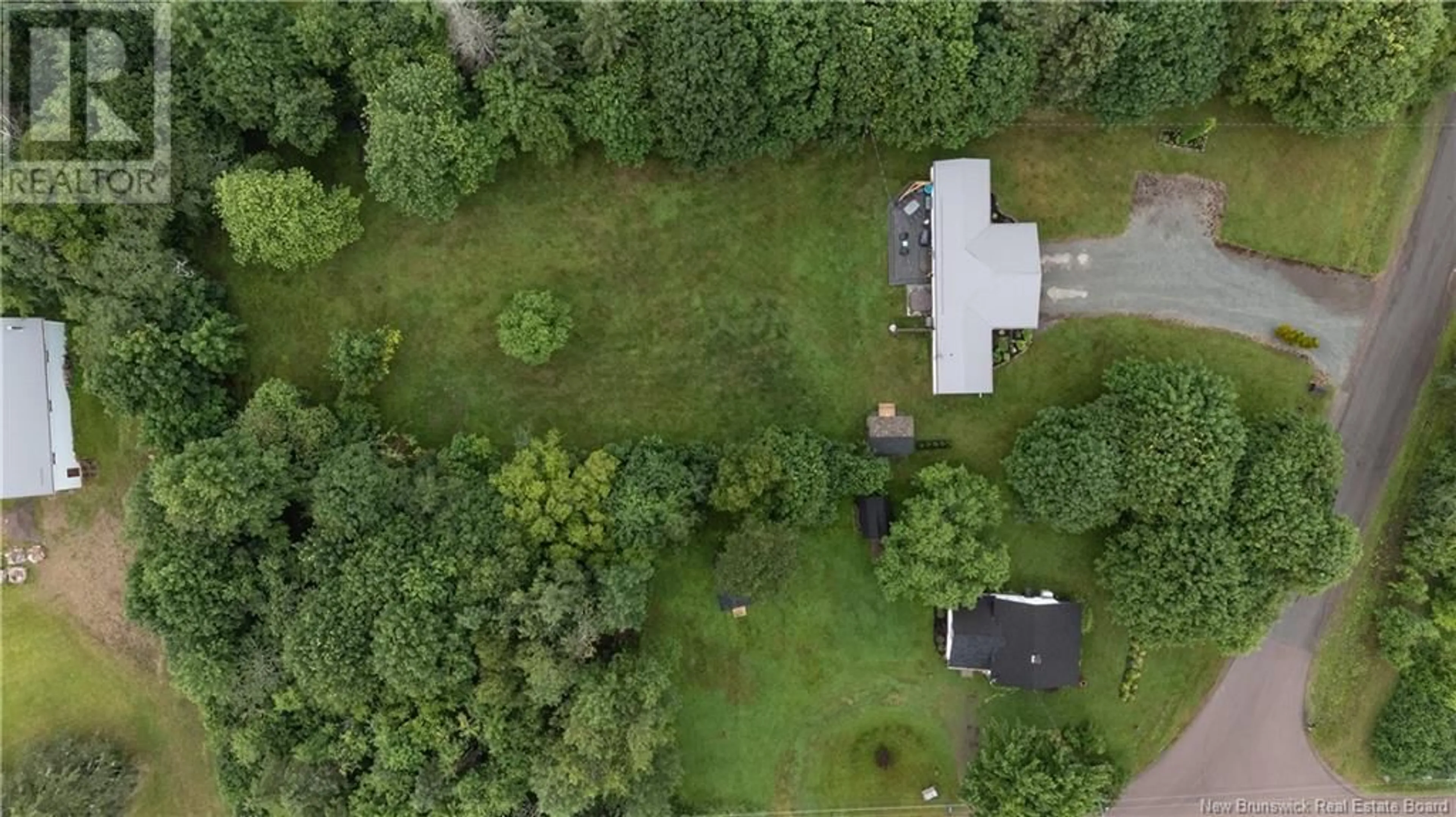 A pic from outside/outdoor area/front of a property/back of a property/a pic from drone, forest/trees view for 211 PLEASANT STREET, Hillsborough New Brunswick E4H3B2