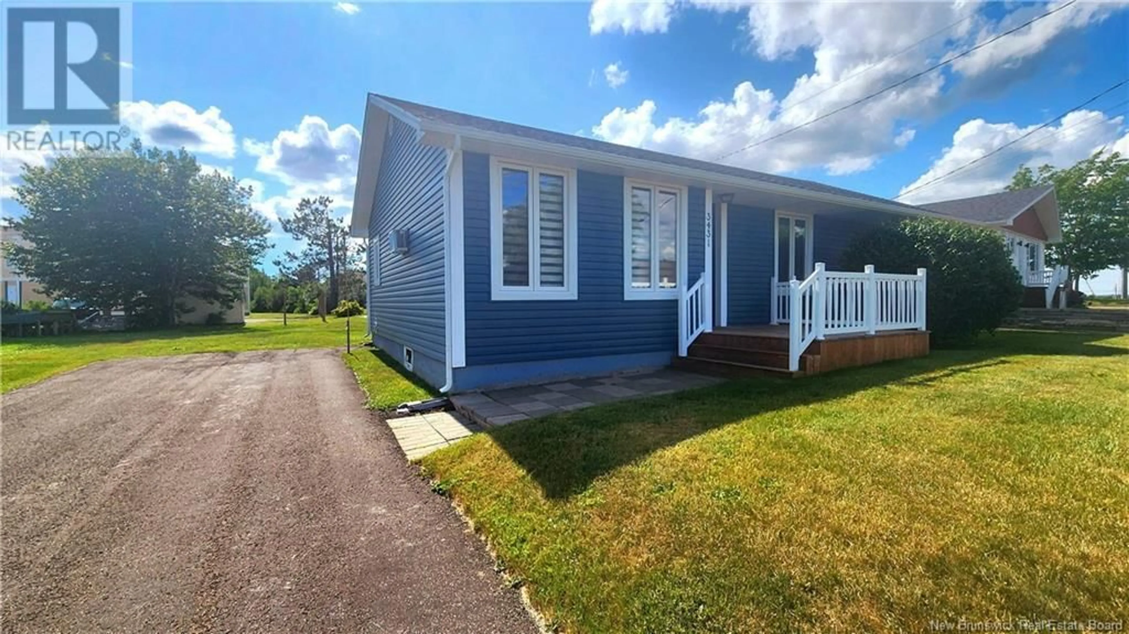 Home with vinyl exterior material, street for 3431 RUE ALBERT, Tracadie New Brunswick E1X1C8