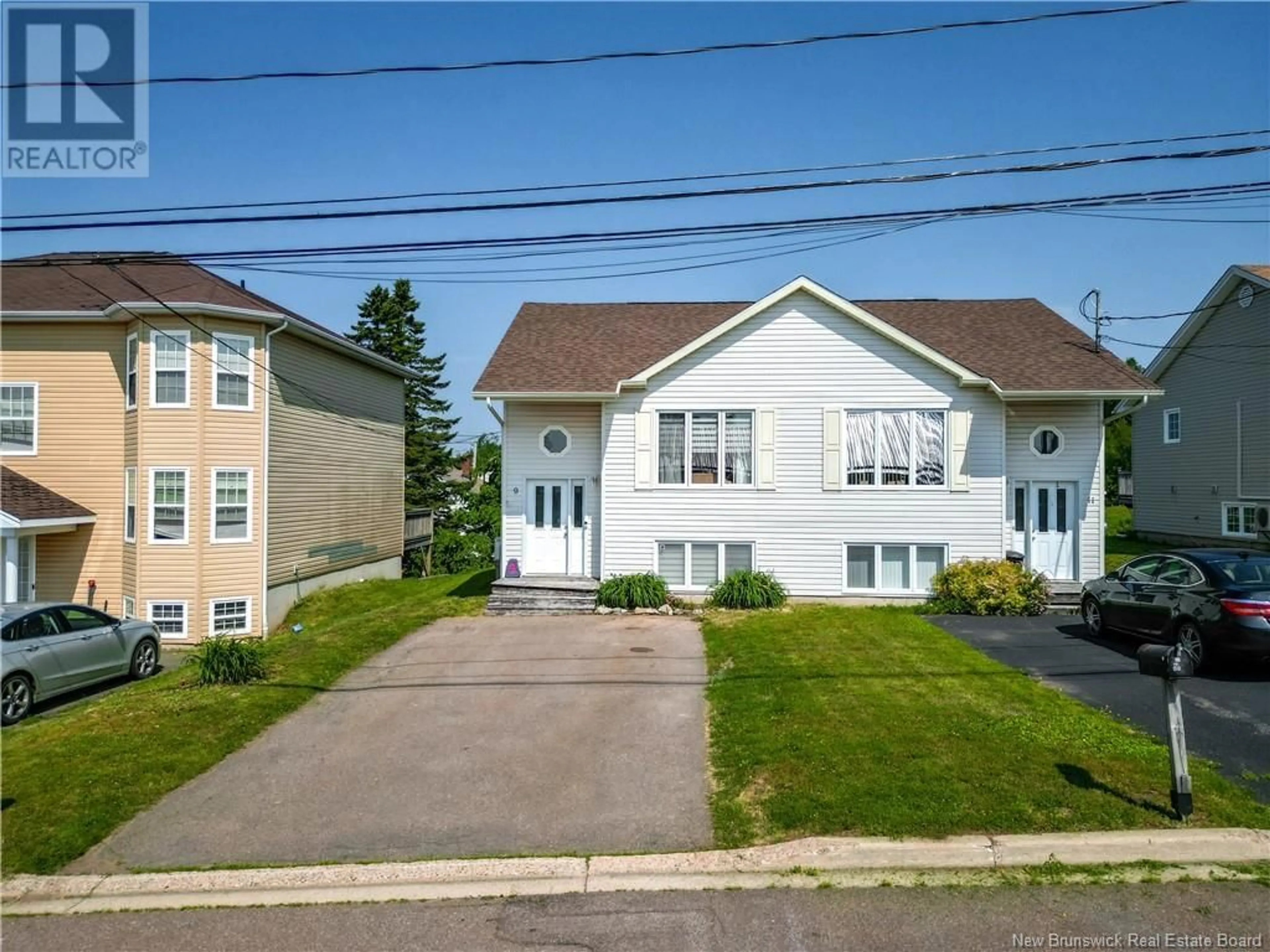A pic from outside/outdoor area/front of a property/back of a property/a pic from drone, street for 9 LANDRY, Moncton New Brunswick E1A7A4