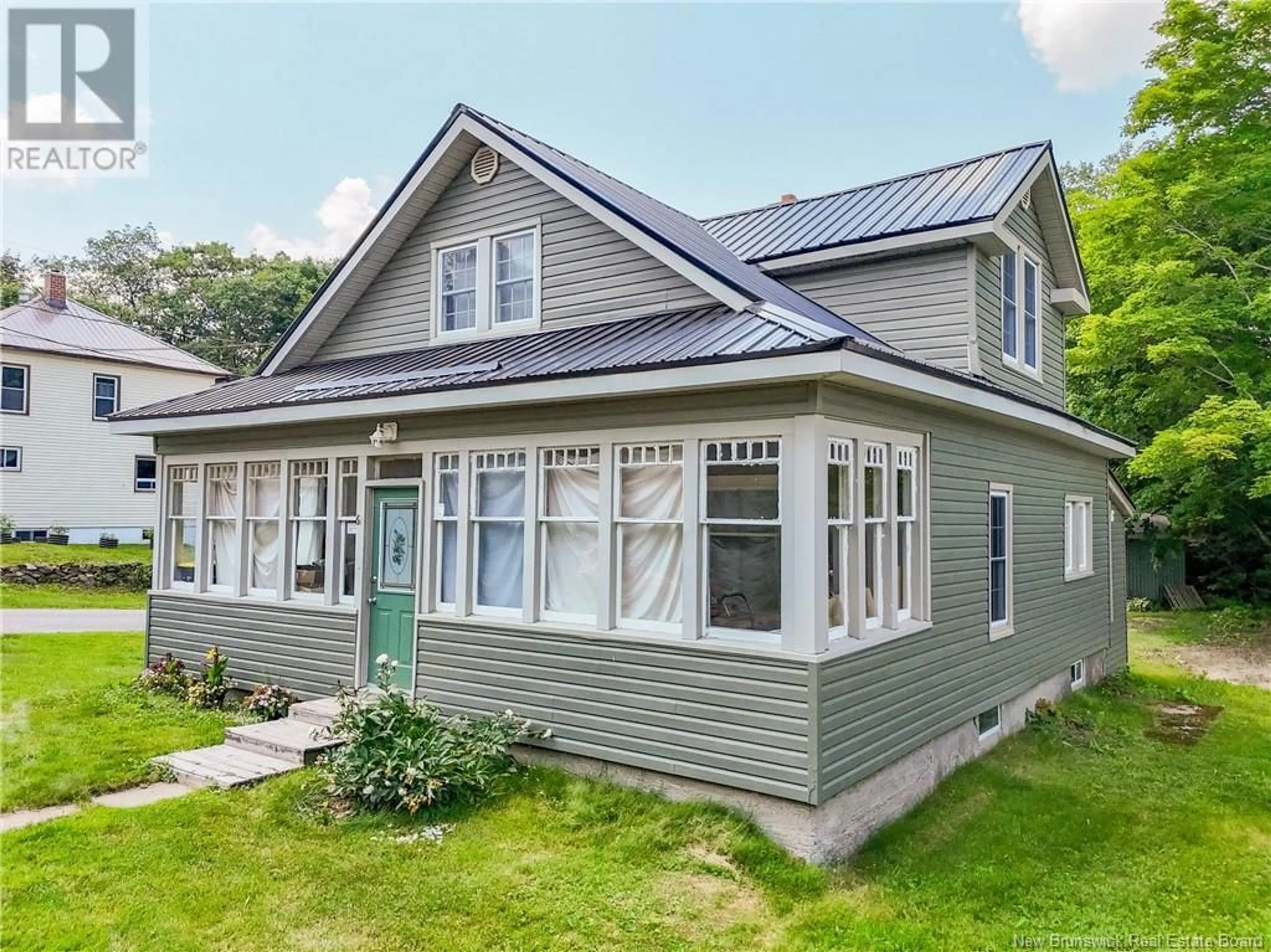 Home with vinyl exterior material, street for 61 SAUNDERS ROAD, McAdam New Brunswick E6J1L4