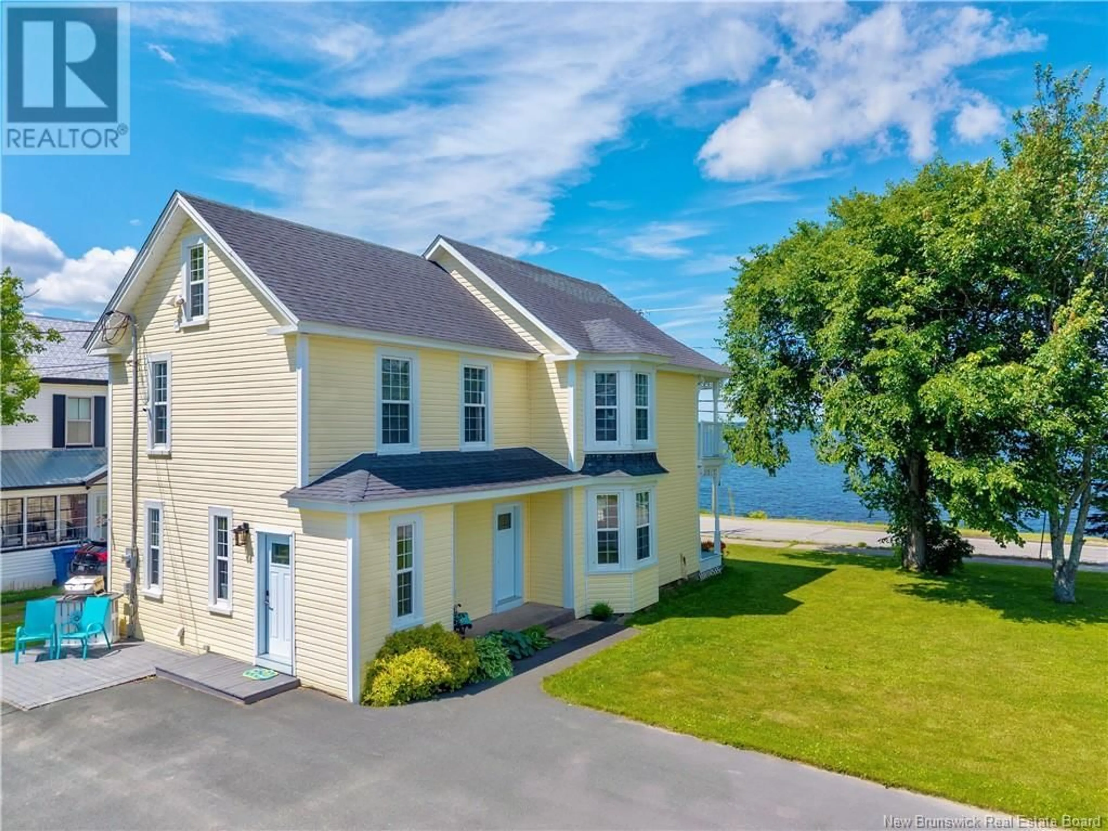 A pic from outside/outdoor area/front of a property/back of a property/a pic from drone, water/lake/river/ocean view for 2 SUTTON ROAD, Miramichi New Brunswick E1N5V7
