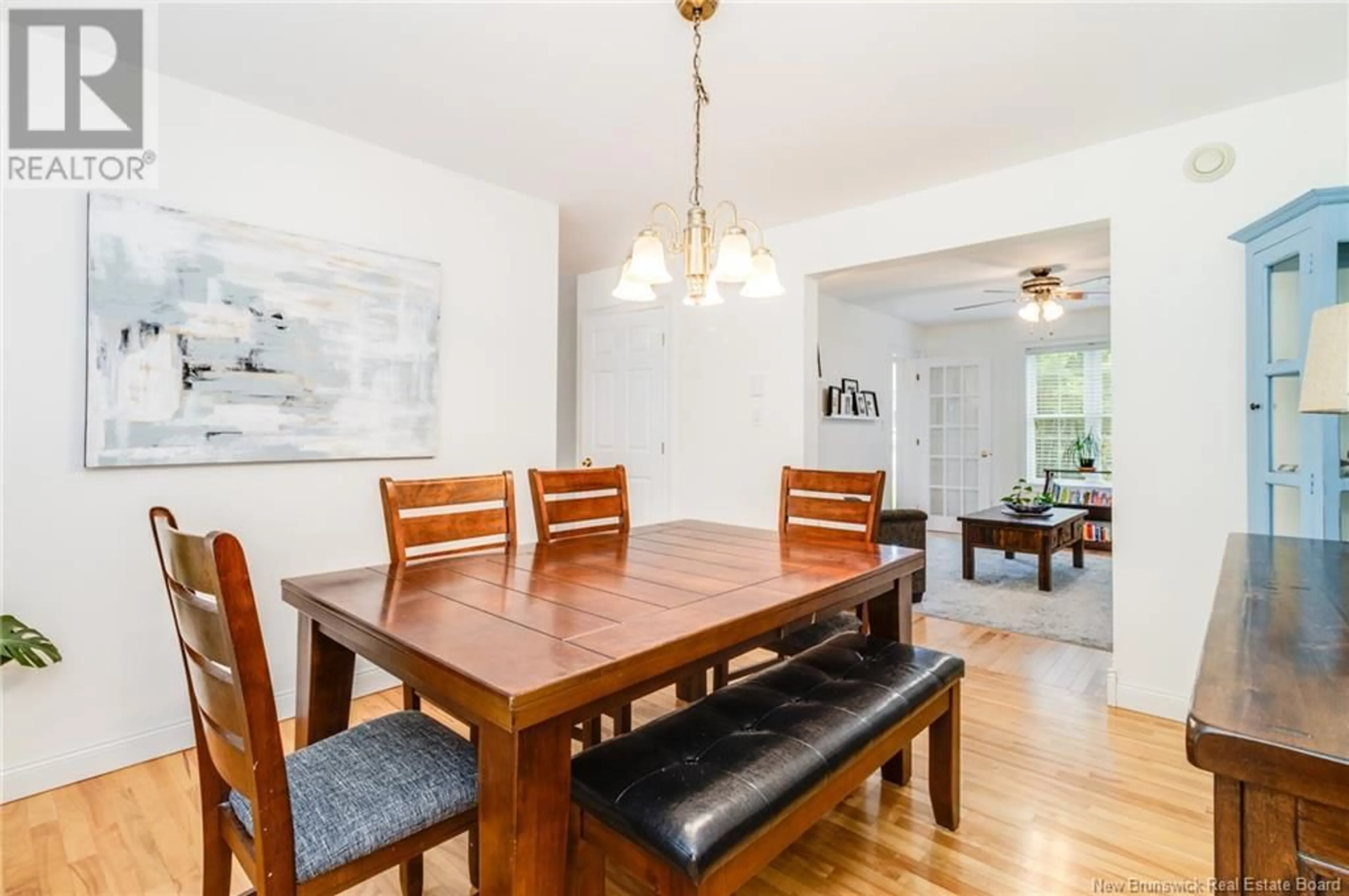 Dining room, wood/laminate floor for 44 TUCANA DRIVE, Hanwell New Brunswick E3C1M9