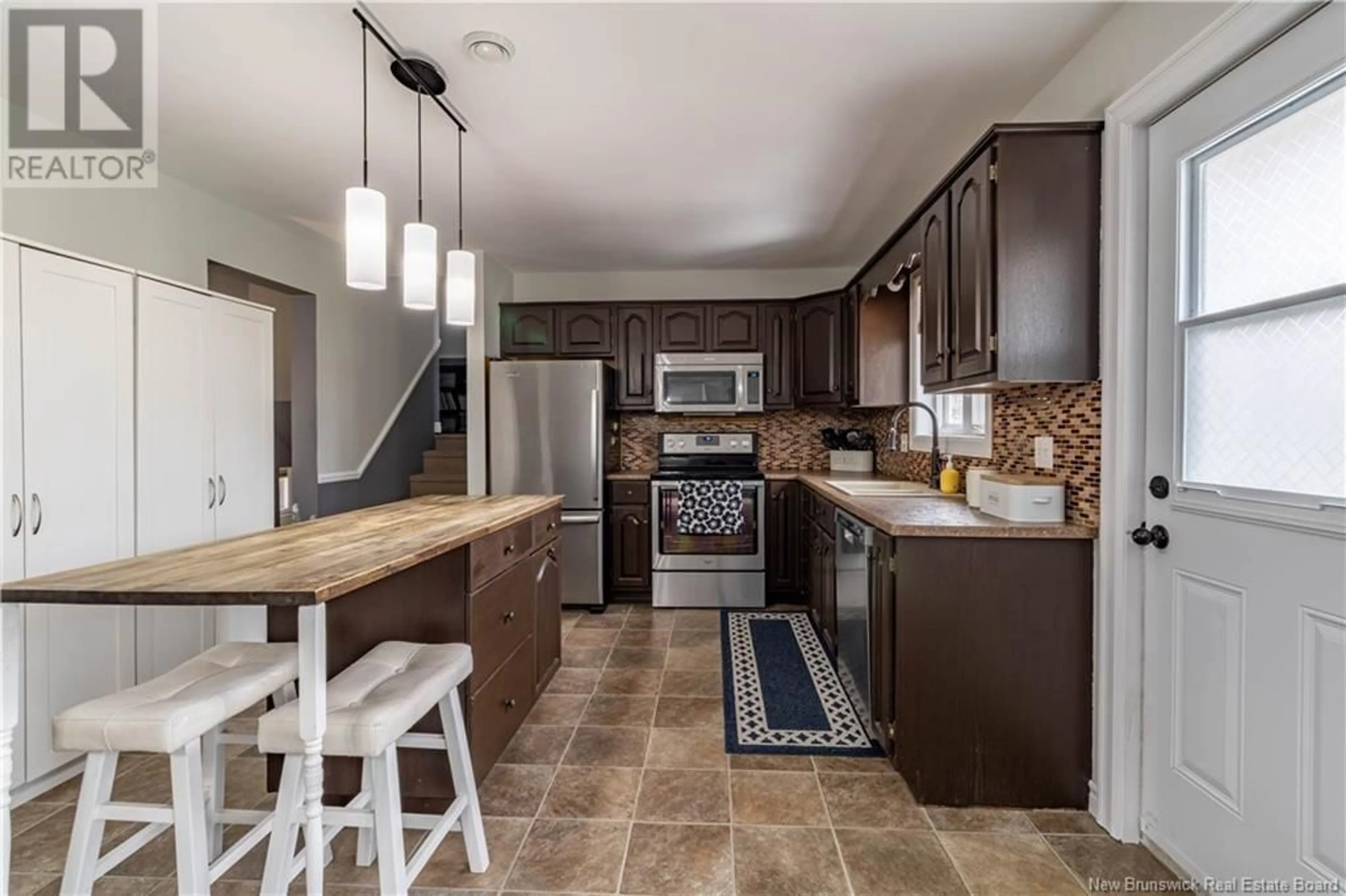 Open concept kitchen, ceramic/tile floor for 13 AMBERWOOD COURT, Moncton New Brunswick E1C9H1
