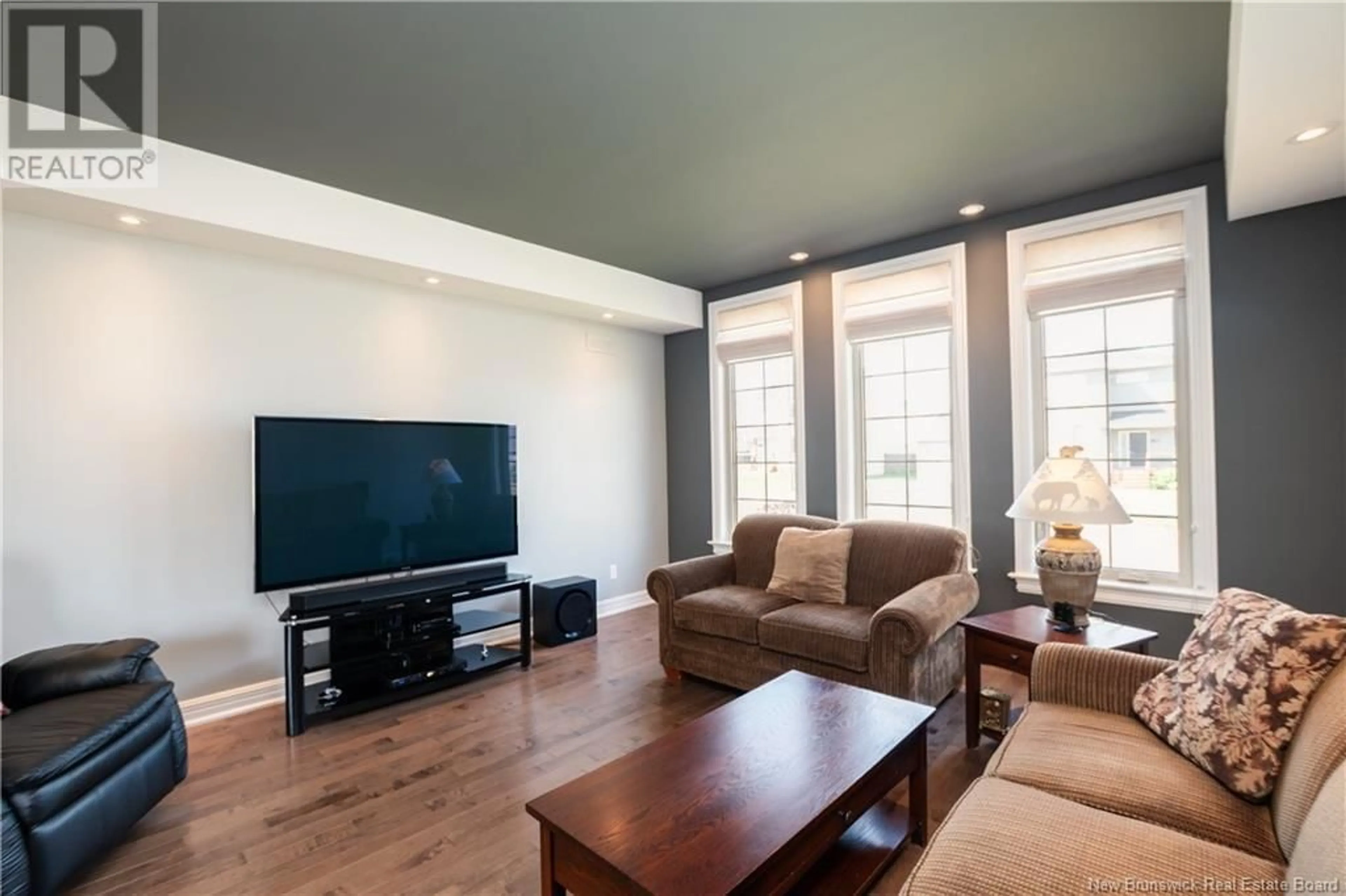 Living room with furniture, wood/laminate floor for 144 OAKFIELD DRIVE, Riverview New Brunswick E1B0S6