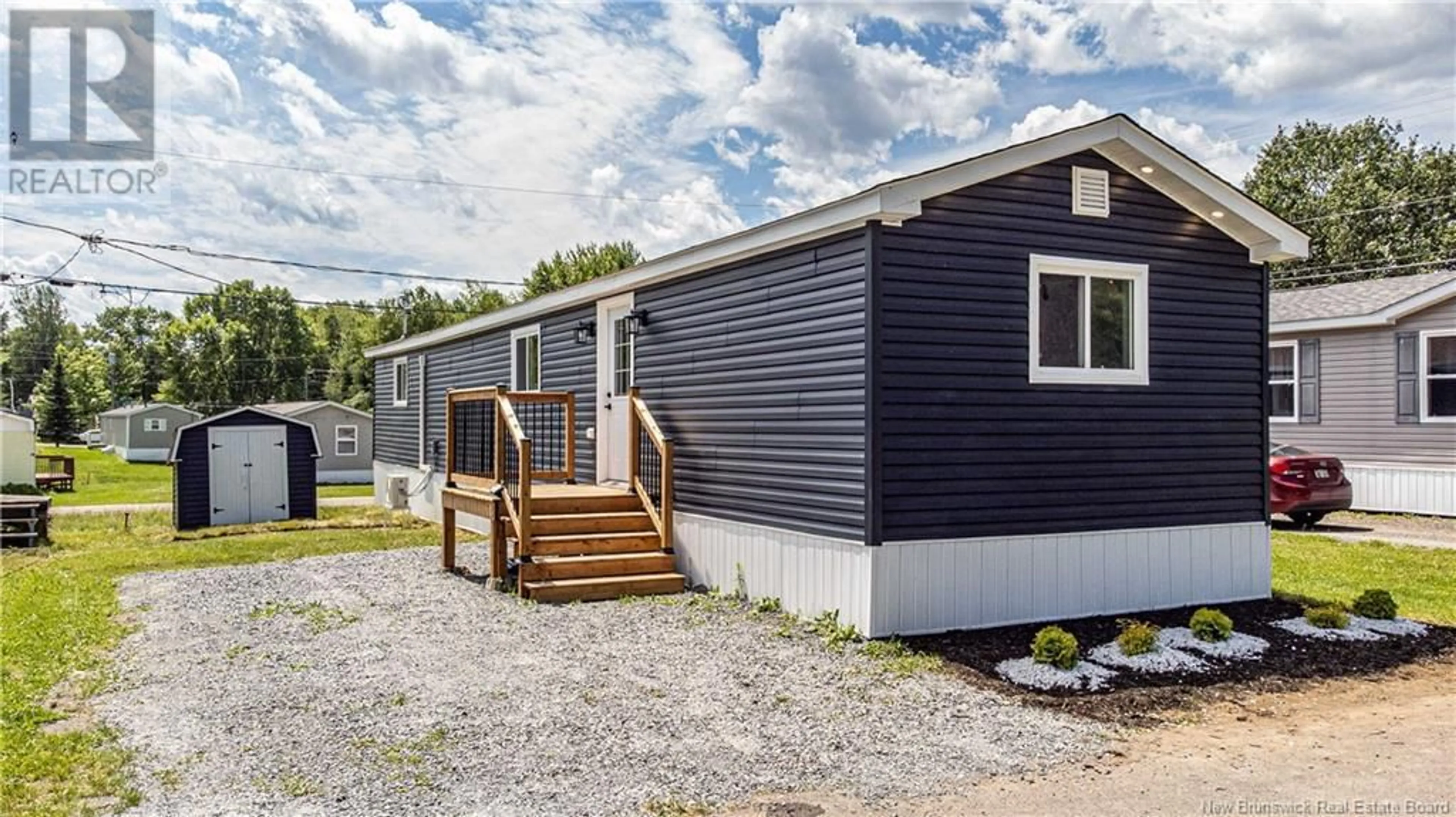 Home with vinyl exterior material, street for 74 ROUTE 102, Burton New Brunswick E2V2Y8