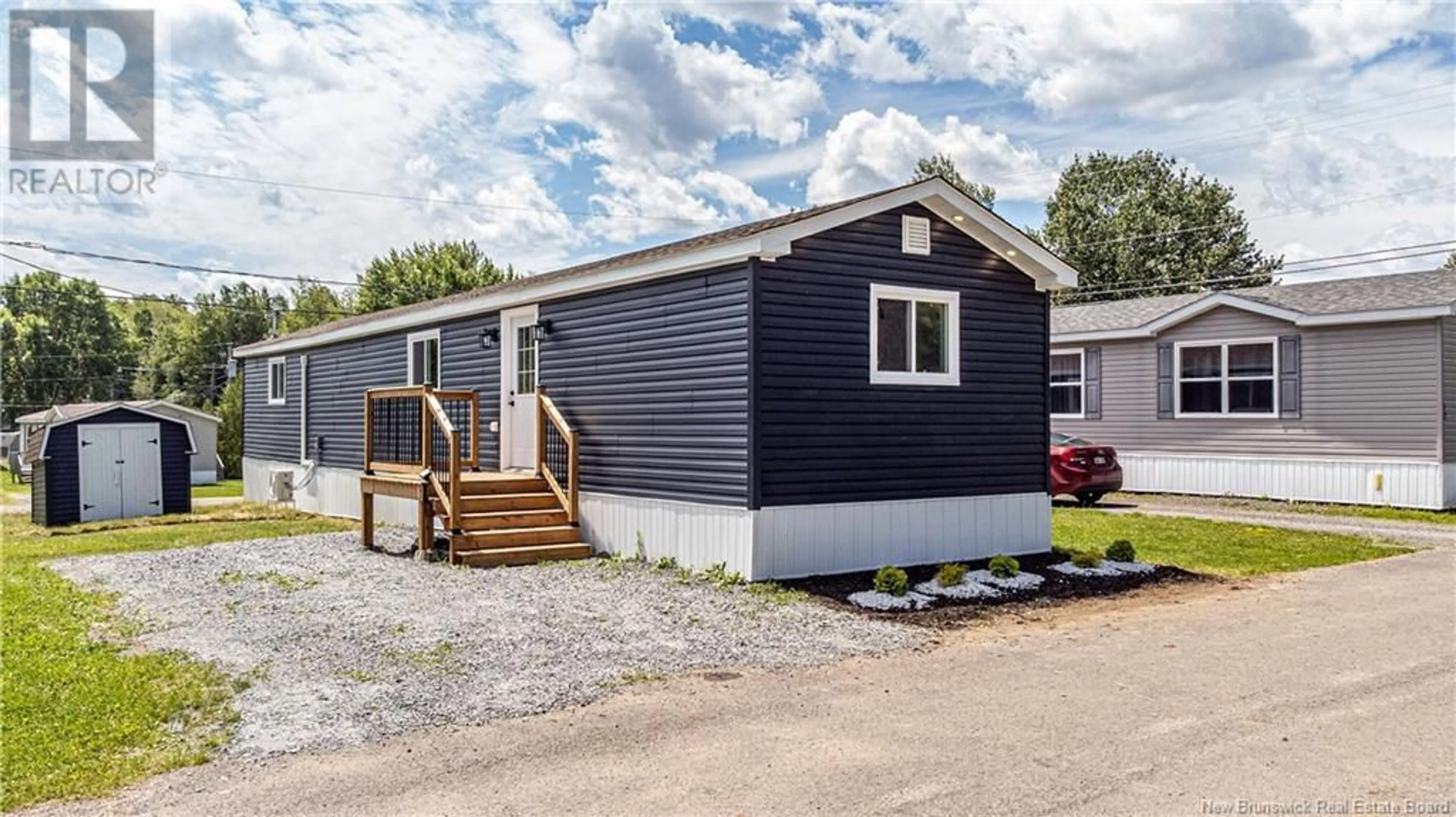 Home with vinyl exterior material, street for 74 ROUTE 102, Burton New Brunswick E2V2Y8