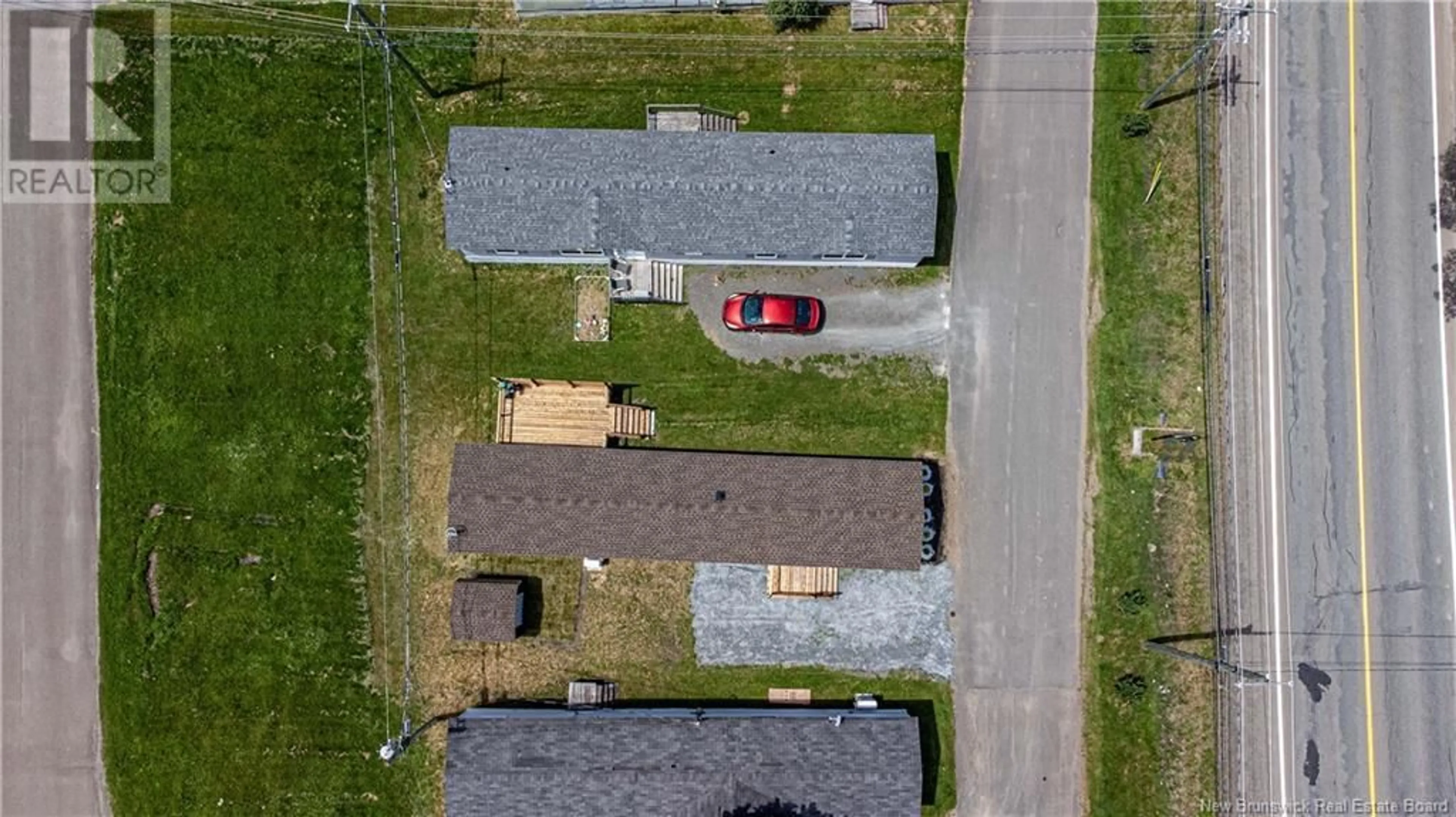 A pic from outside/outdoor area/front of a property/back of a property/a pic from drone, street for 74 ROUTE 102, Burton New Brunswick E2V2Y8