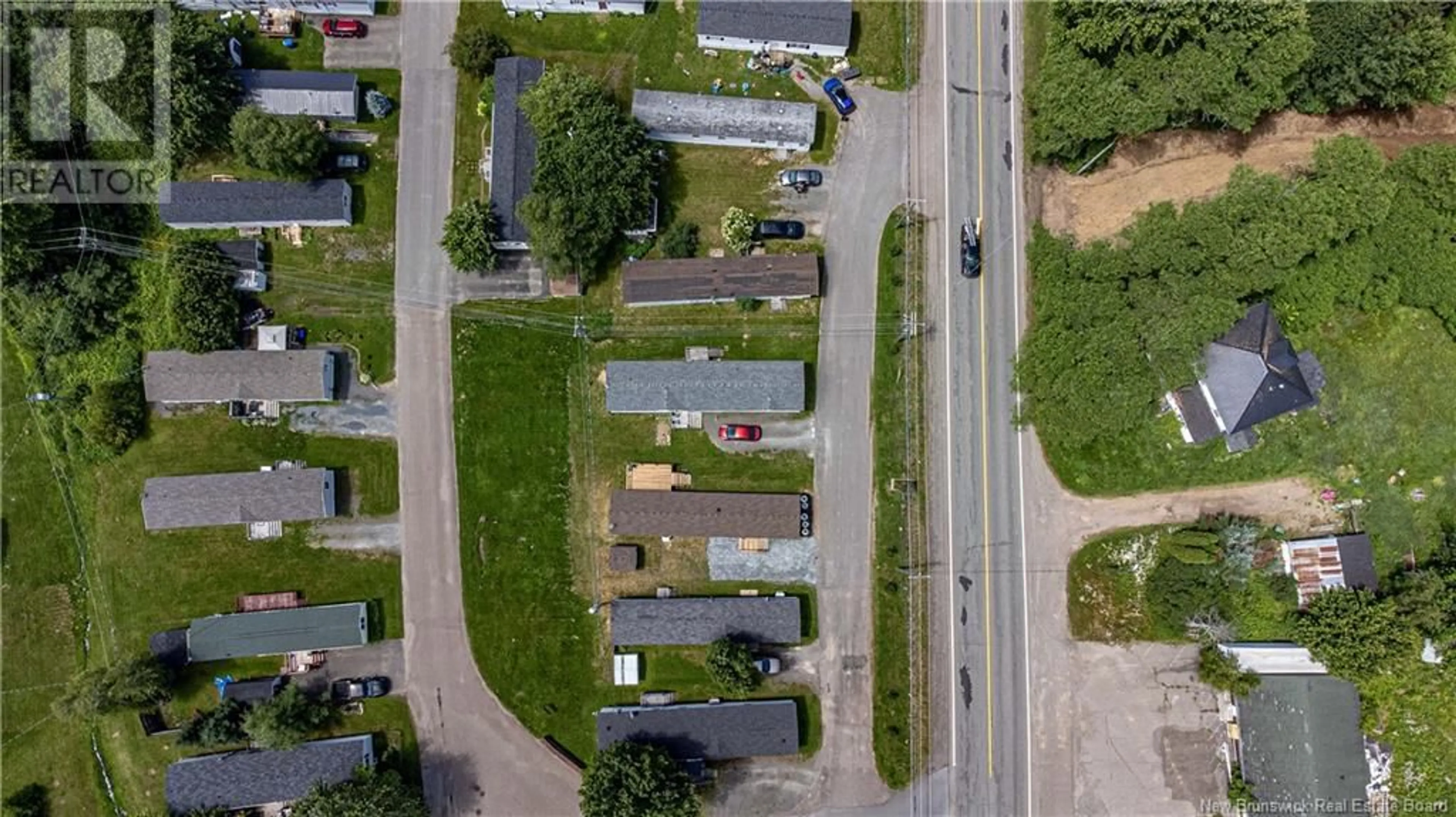 A pic from outside/outdoor area/front of a property/back of a property/a pic from drone, street for 74 ROUTE 102, Burton New Brunswick E2V2Y8
