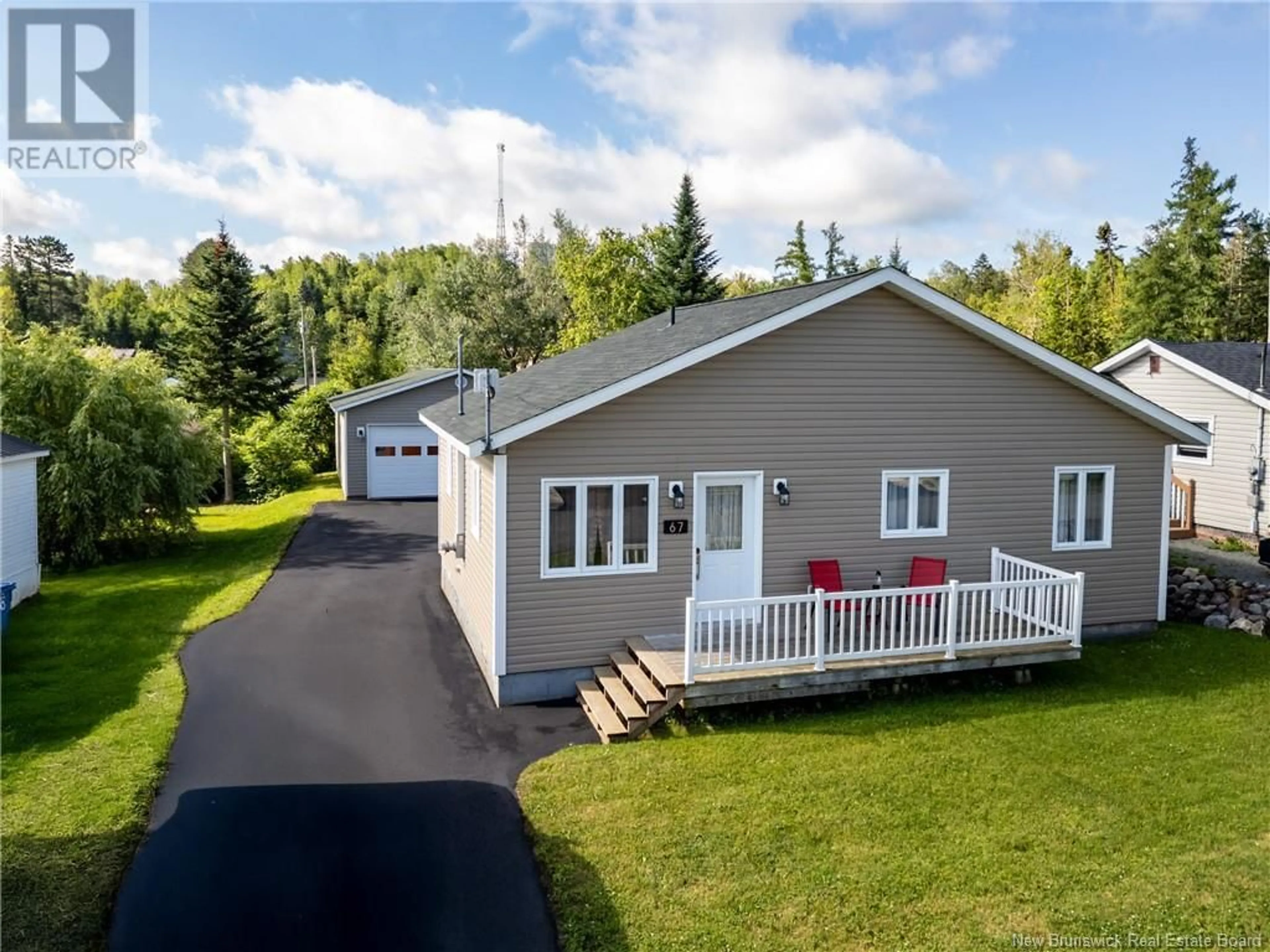 Home with vinyl exterior material, street for 67 POST STREET, Plaster Rock New Brunswick E7G2M7