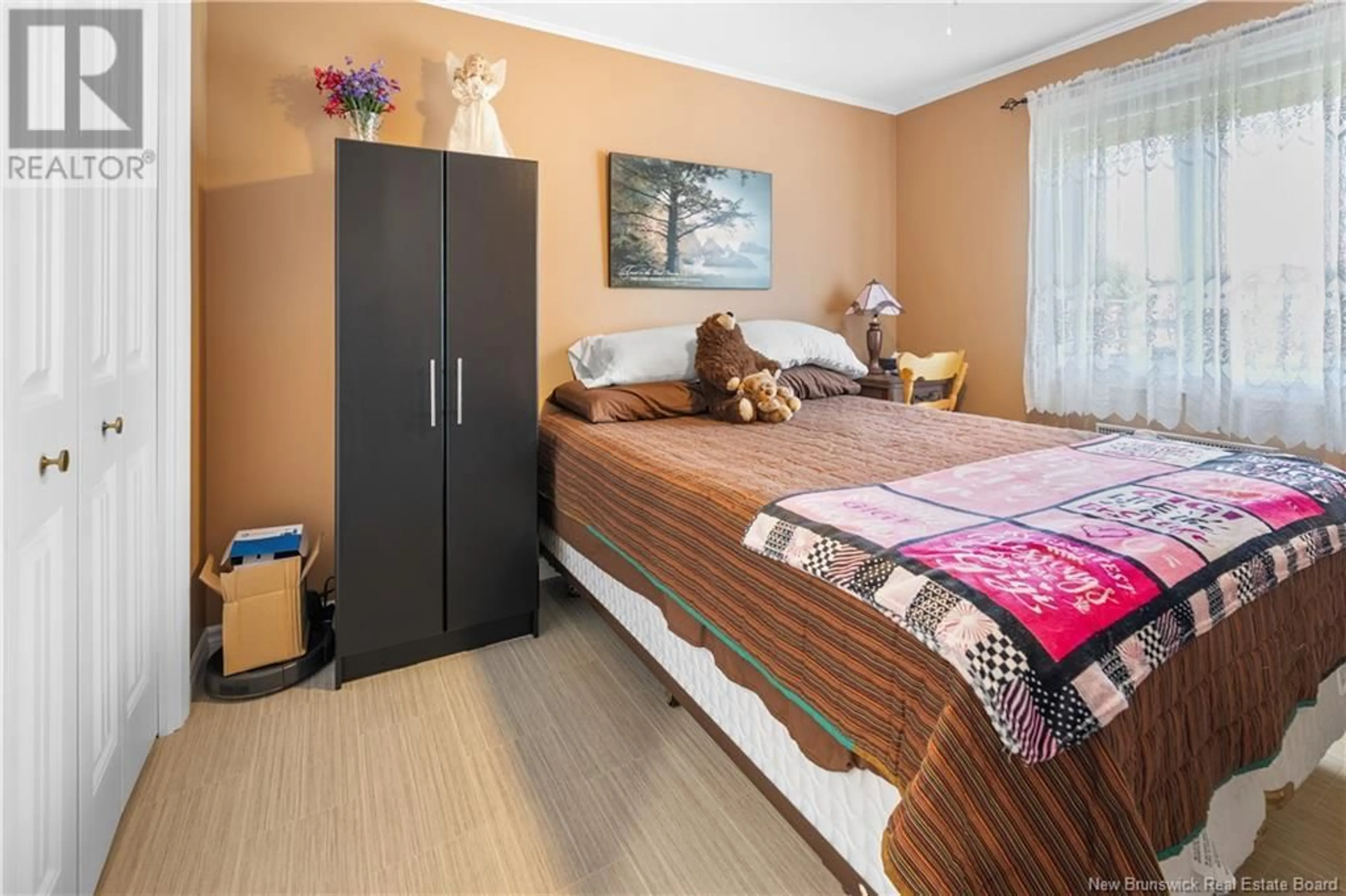 Bedroom with bed, wood/laminate floor for 67 POST STREET, Plaster Rock New Brunswick E7G2M7