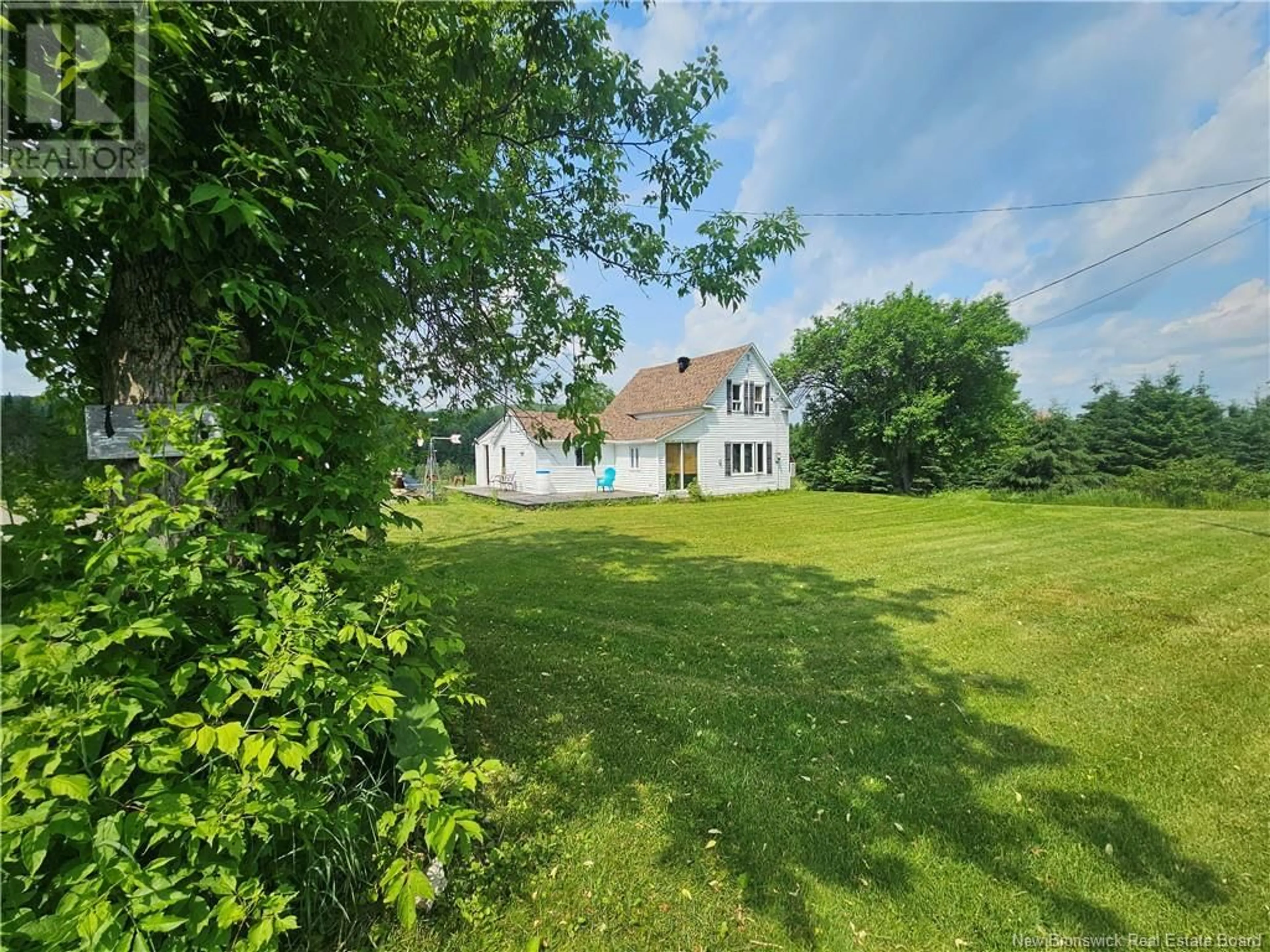 A pic from outside/outdoor area/front of a property/back of a property/a pic from drone, water/lake/river/ocean view for 130 KING KRISTIAN ROAD, New Denmark New Brunswick E7G1X7