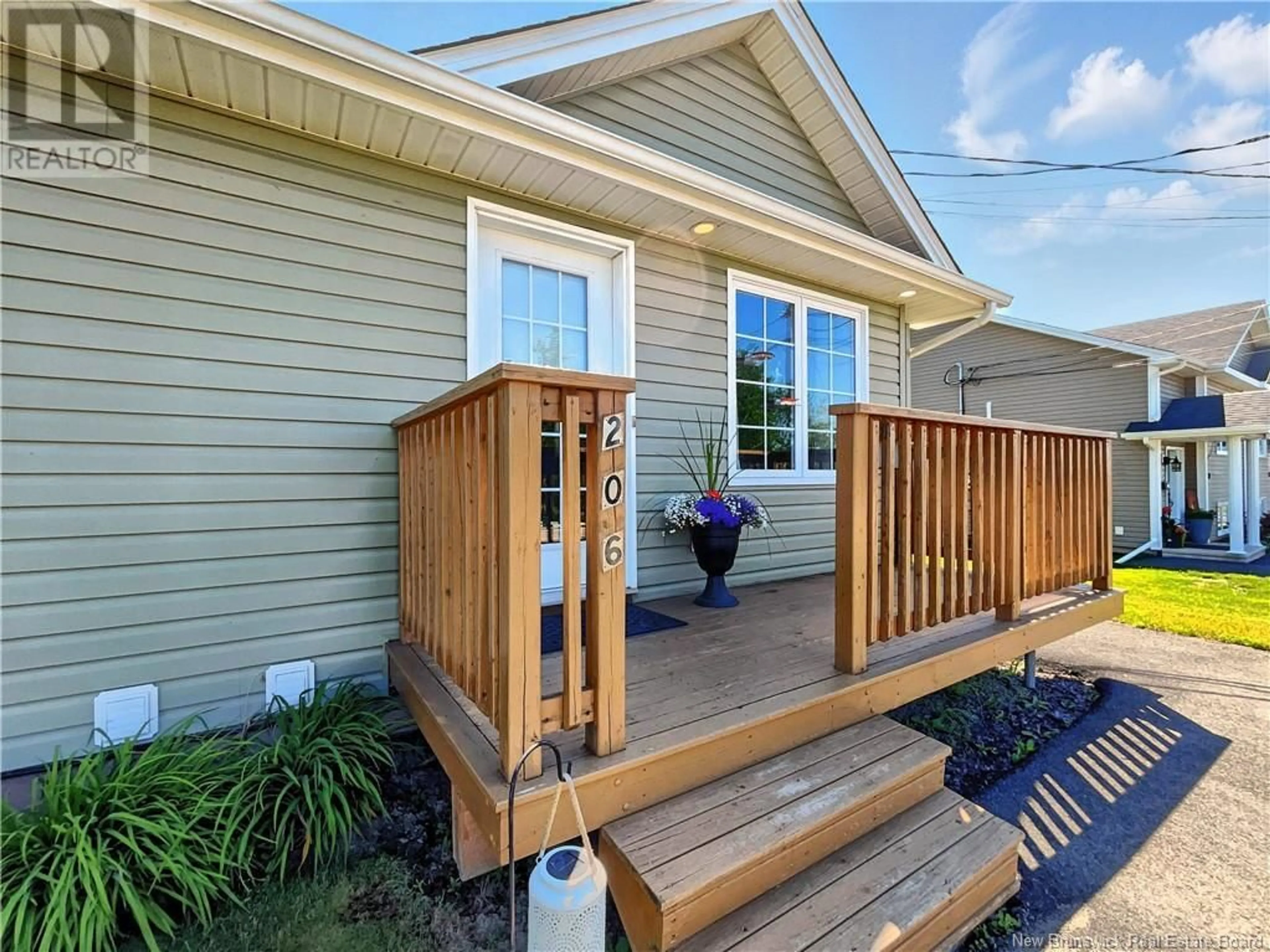 Home with vinyl exterior material, street for 206 LORETTE STREET, Dieppe New Brunswick E1A0E2