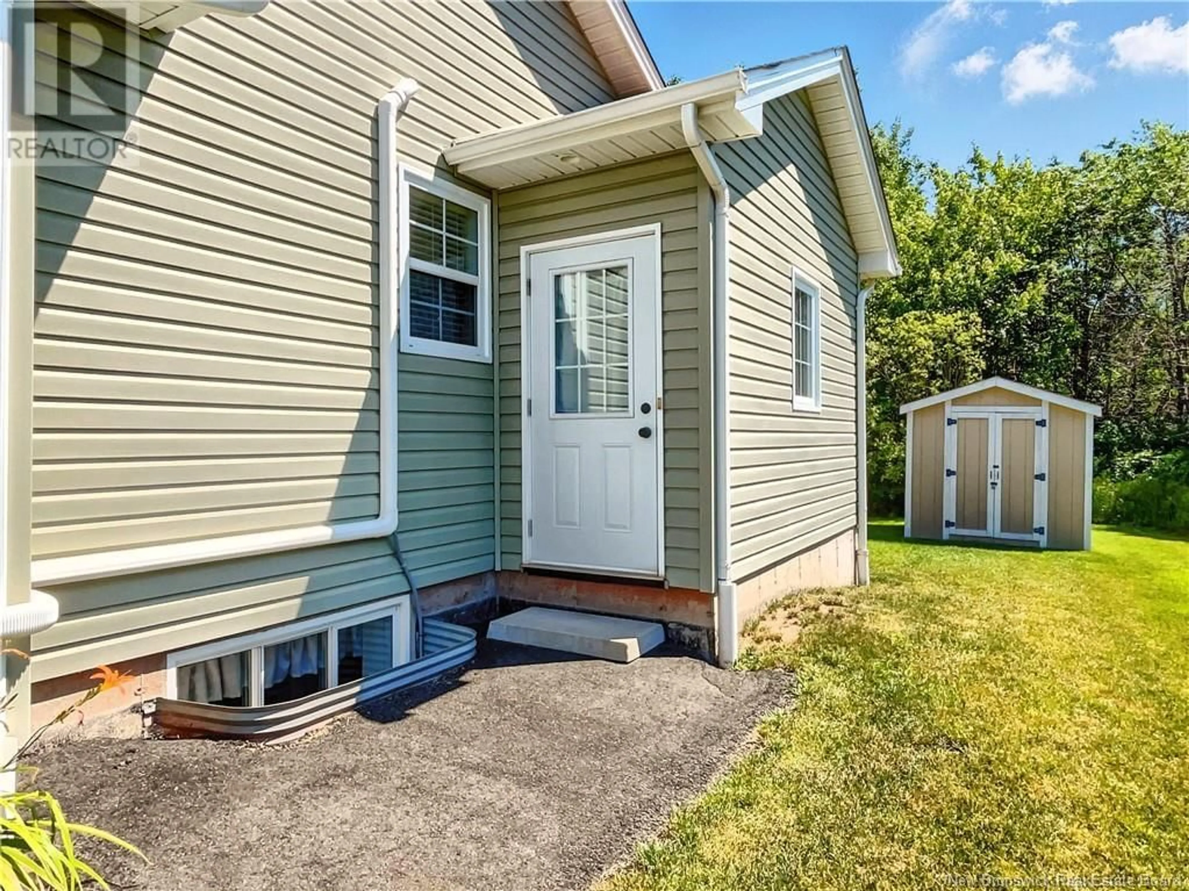 Home with vinyl exterior material, street for 206 LORETTE STREET, Dieppe New Brunswick E1A0E2
