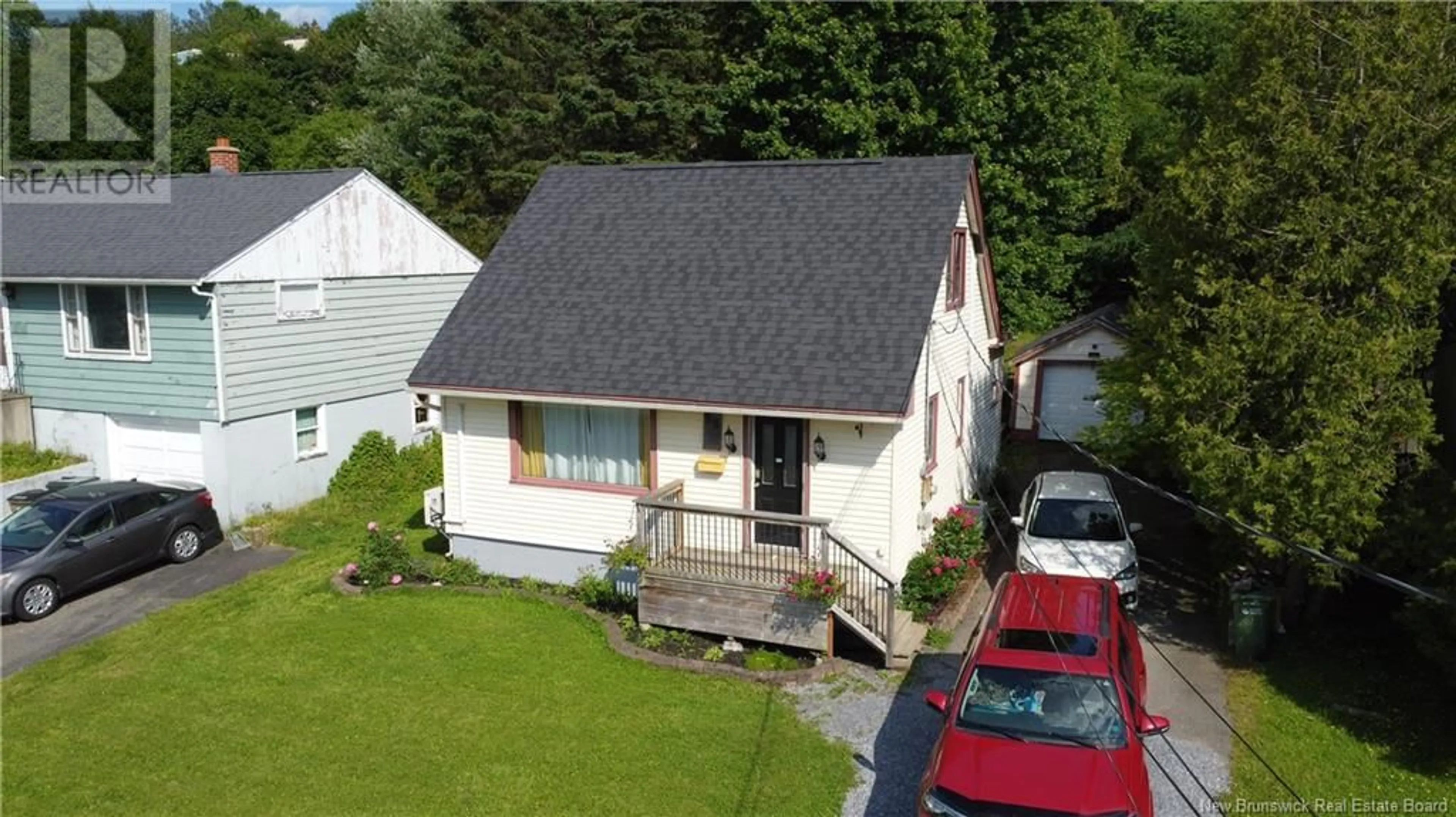 A pic from outside/outdoor area/front of a property/back of a property/a pic from drone, street for 58 PARKS ST. EXTENSION, Saint John New Brunswick E2K3S6