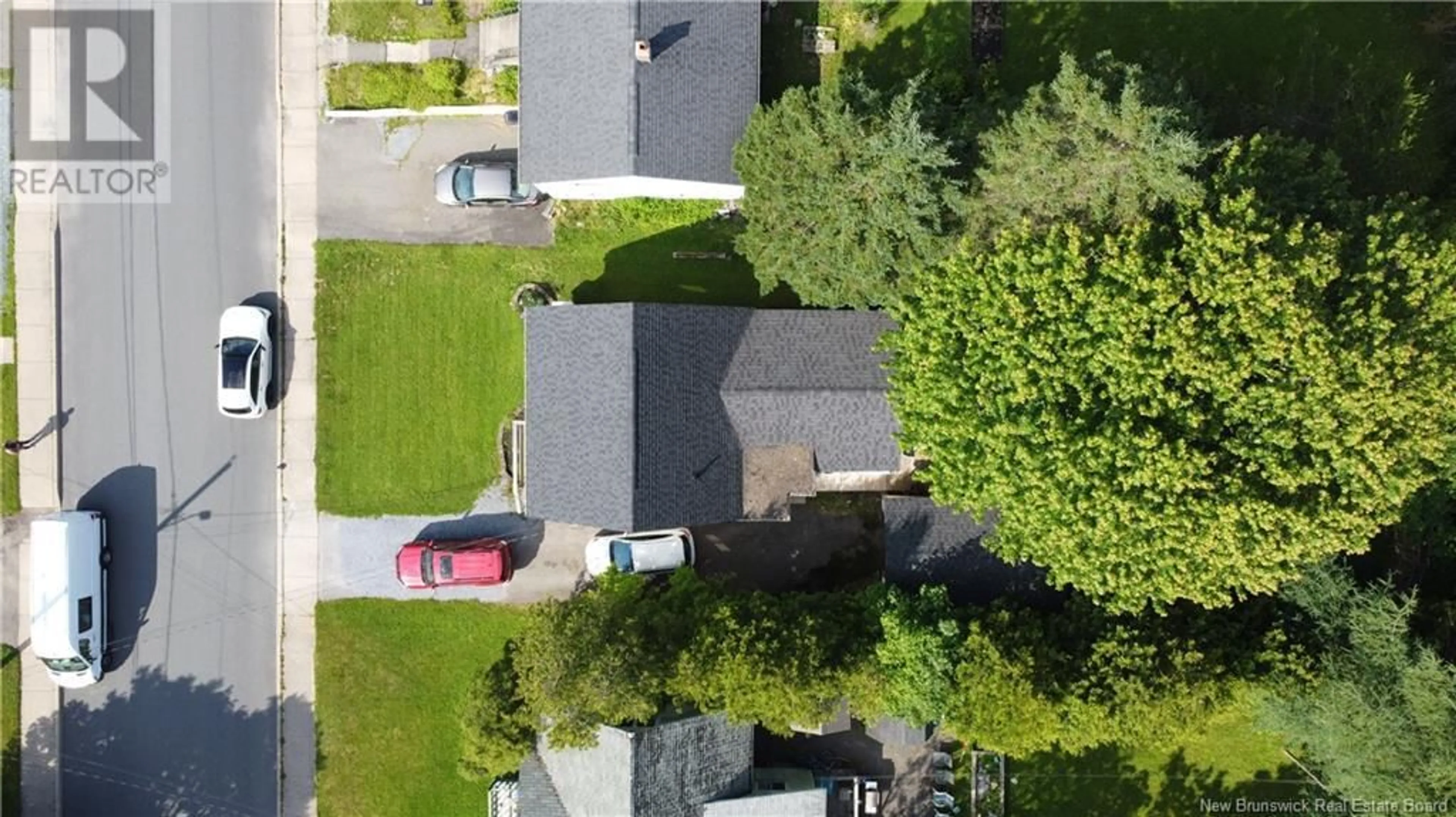 A pic from outside/outdoor area/front of a property/back of a property/a pic from drone, street for 58 PARKS ST. EXTENSION, Saint John New Brunswick E2K3S6