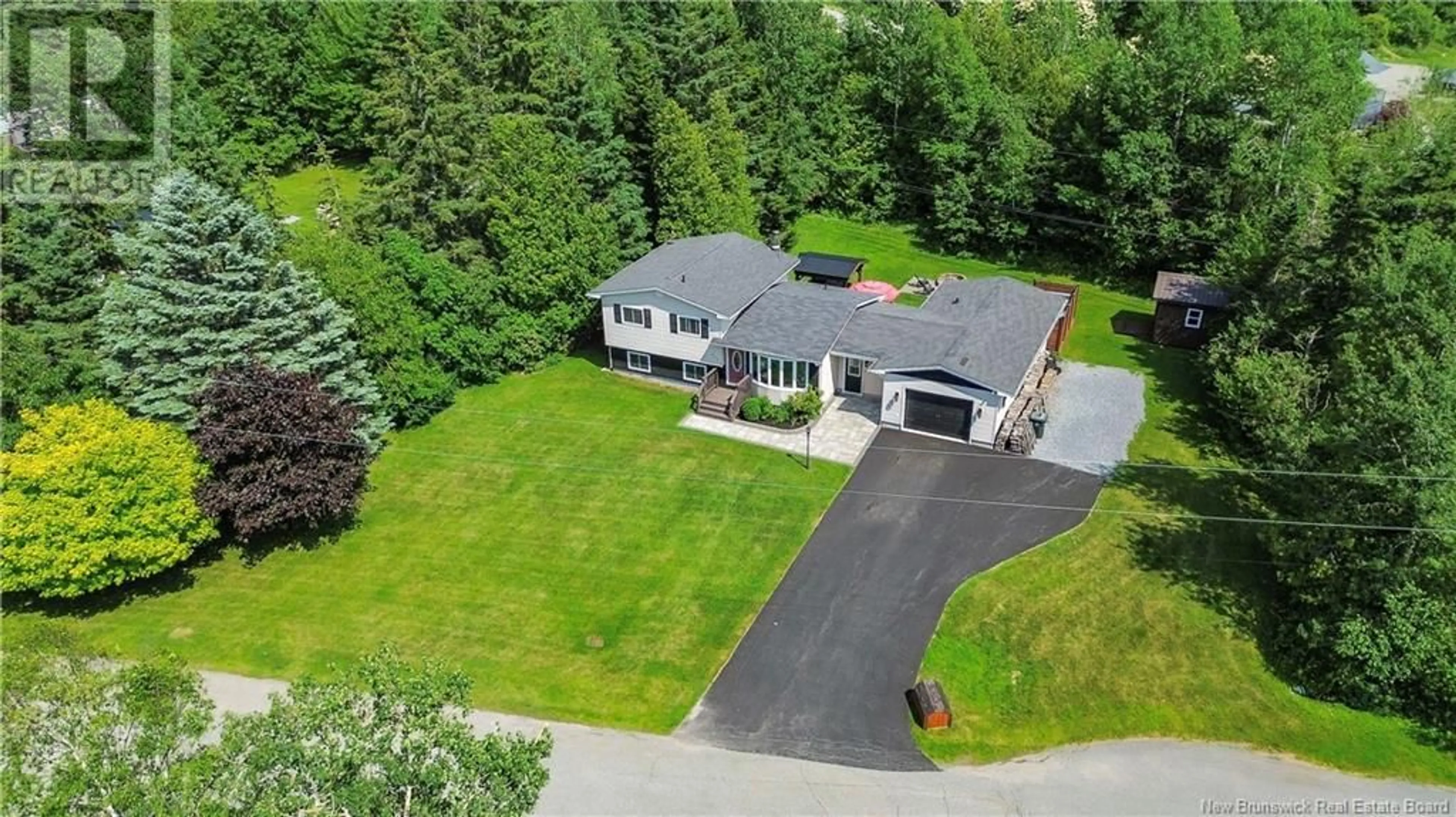 A pic from outside/outdoor area/front of a property/back of a property/a pic from drone, unknown for 117 LAKE ROAD, Quispamsis New Brunswick E2E4P7