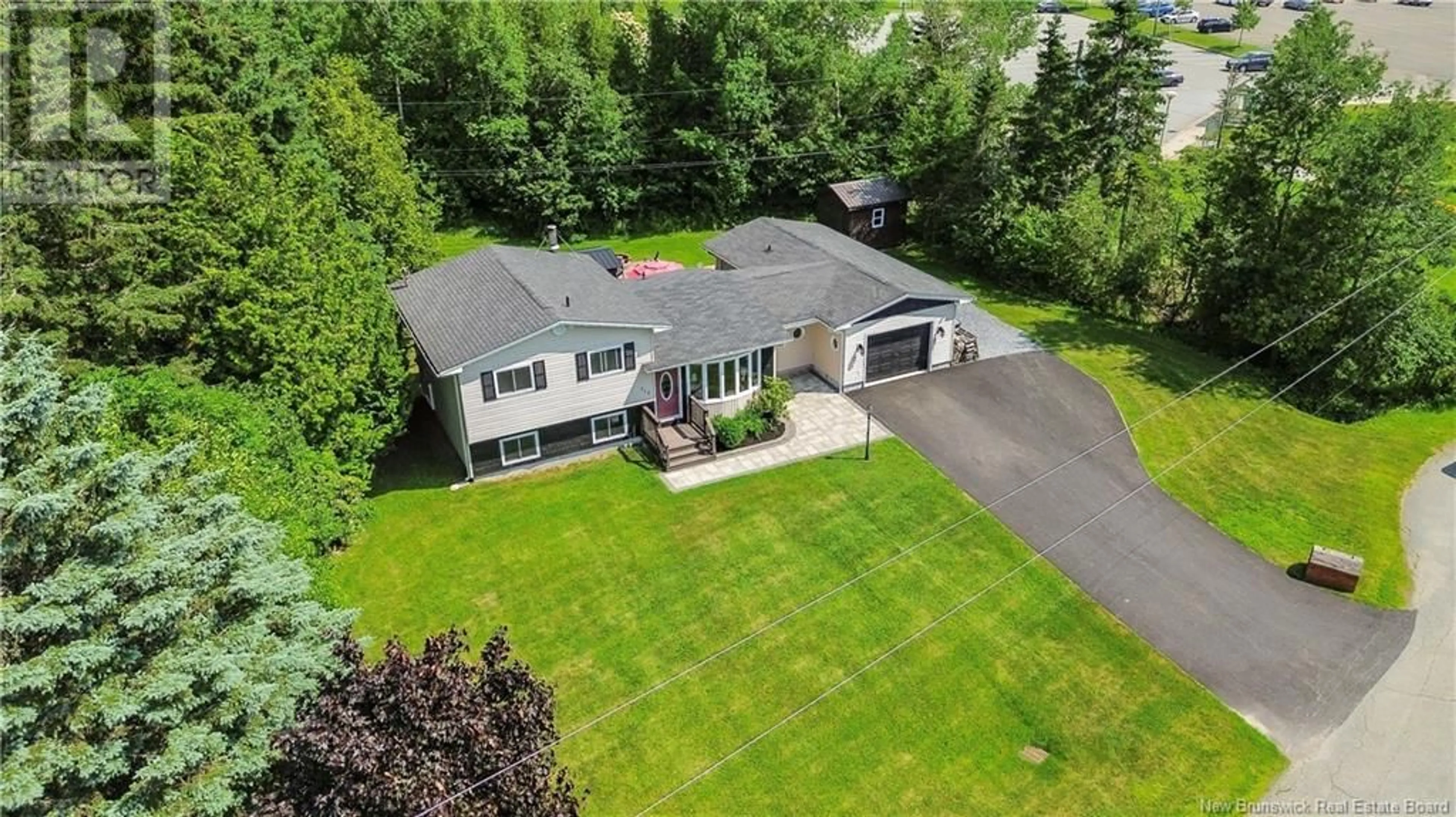 A pic from outside/outdoor area/front of a property/back of a property/a pic from drone, unknown for 117 LAKE ROAD, Quispamsis New Brunswick E2E4P7