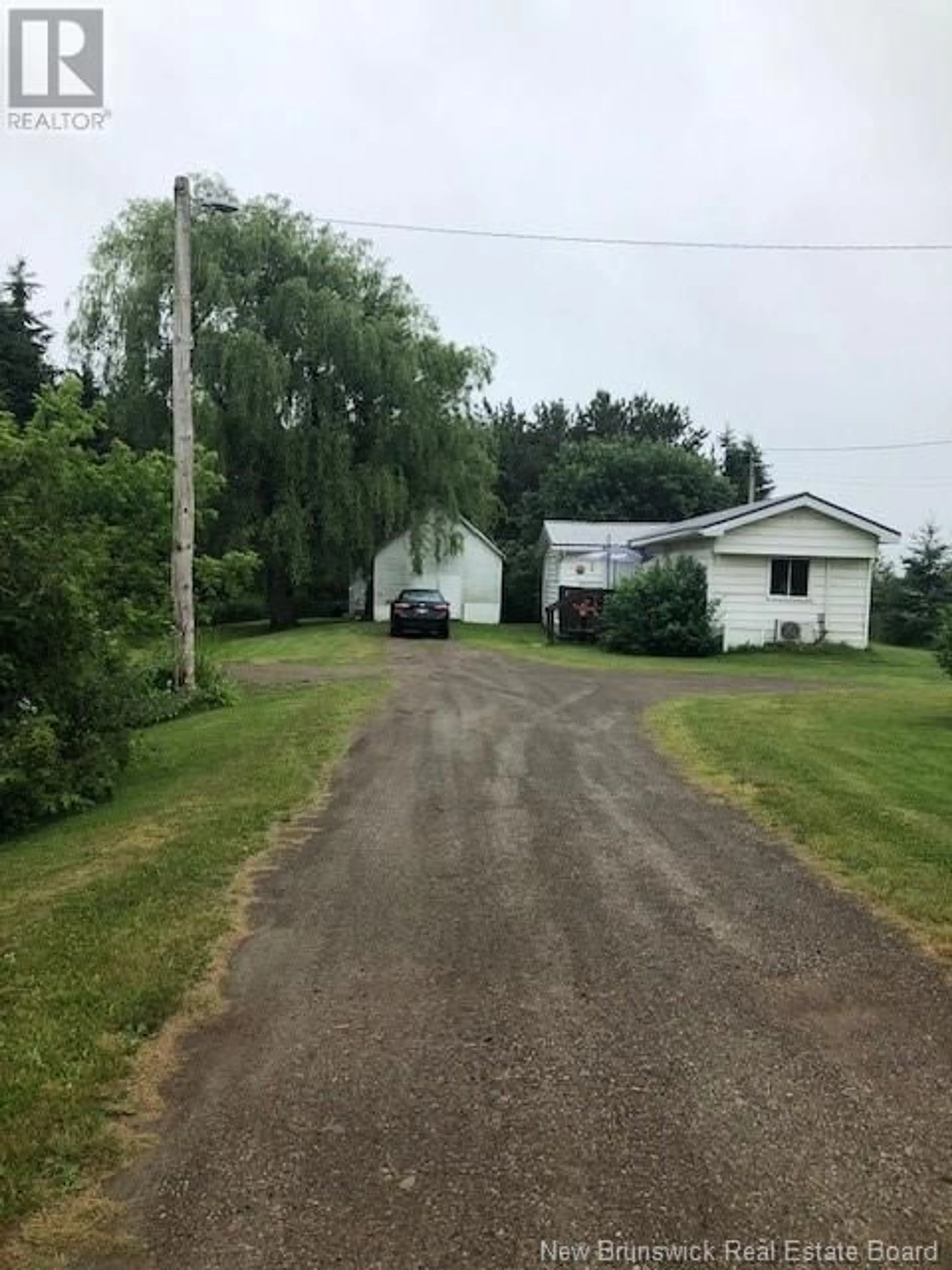 A pic from outside/outdoor area/front of a property/back of a property/a pic from drone, street for 2756 SALISBURY ROAD, Boundary Creek New Brunswick E1G4N1