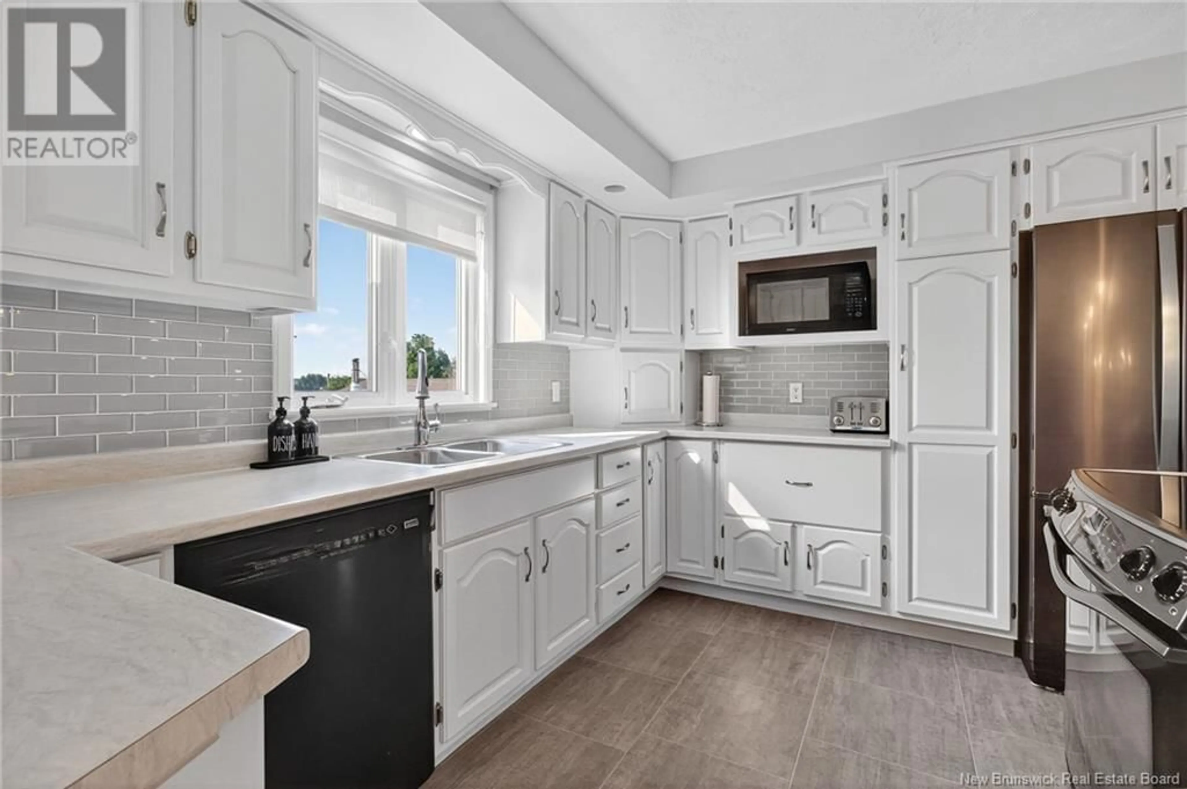 Open concept kitchen, ceramic/tile floor for 222 IRVING, Bouctouche New Brunswick E4S3L7