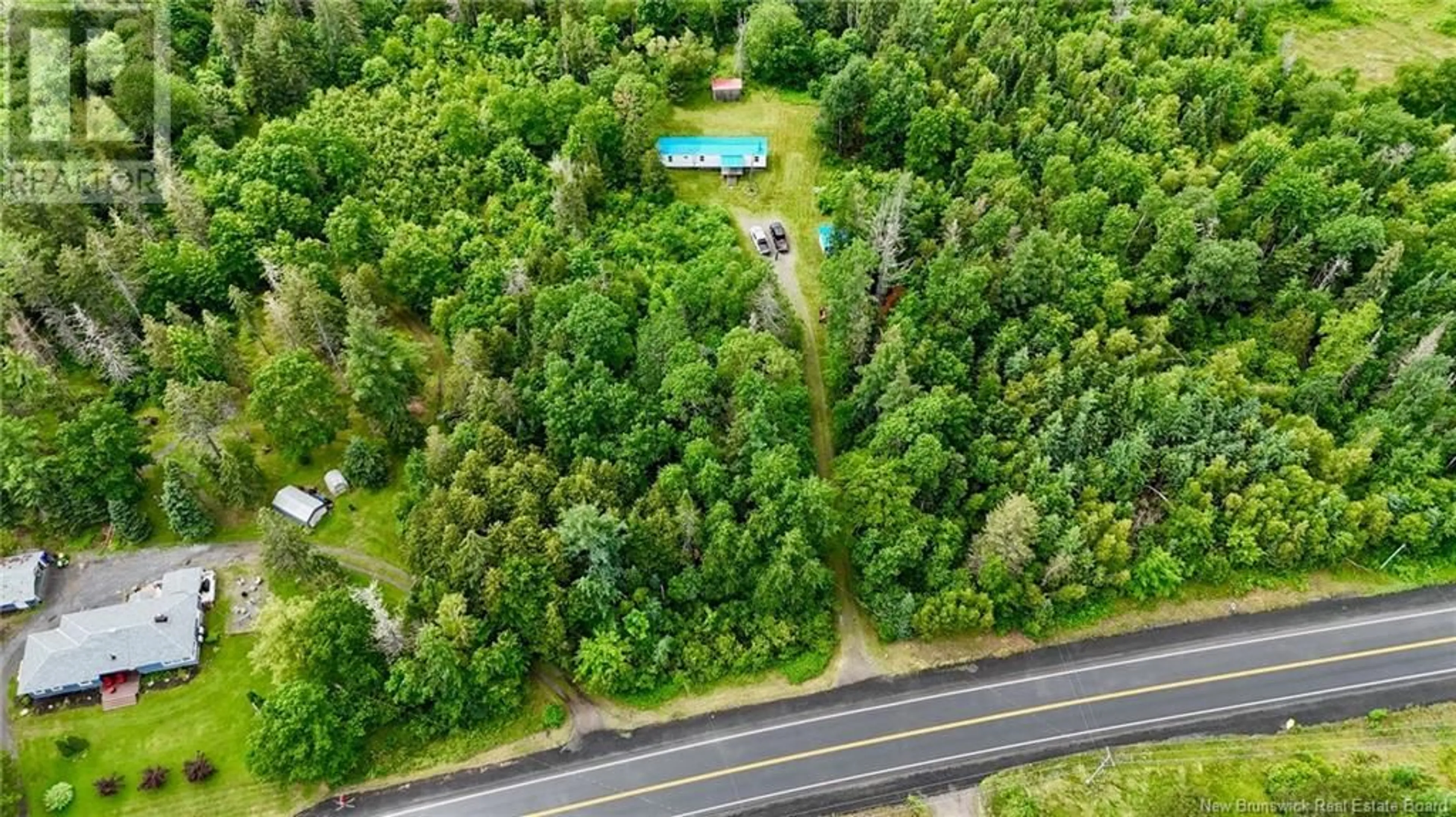A pic from outside/outdoor area/front of a property/back of a property/a pic from drone, forest/trees view for 6254 3 ROUTE, Lawrence Station New Brunswick E5A3C5