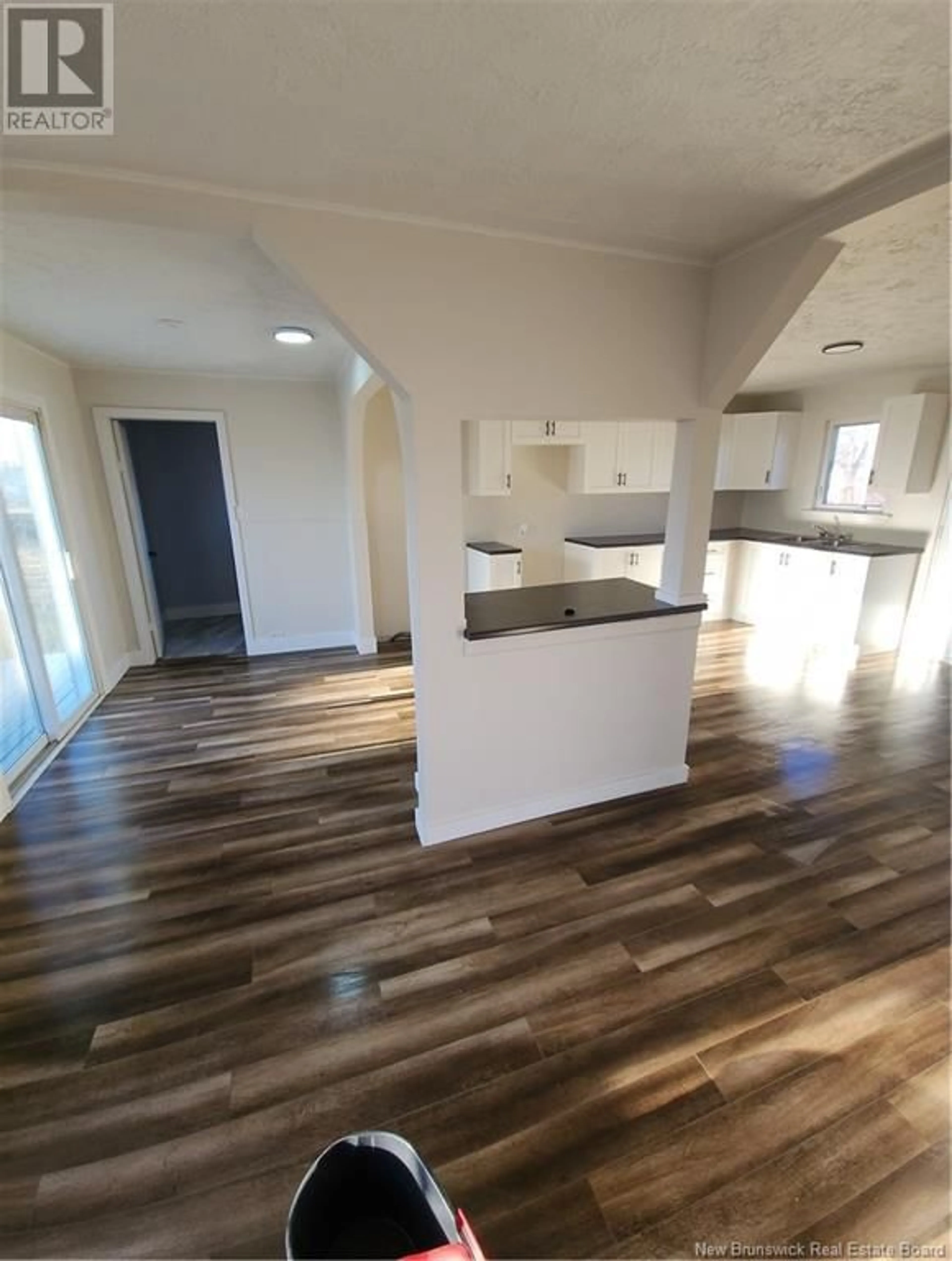 Open concept kitchen, wood/laminate floor for 867 LOUIS G DAIGLE, Tracadie New Brunswick E1X1C2