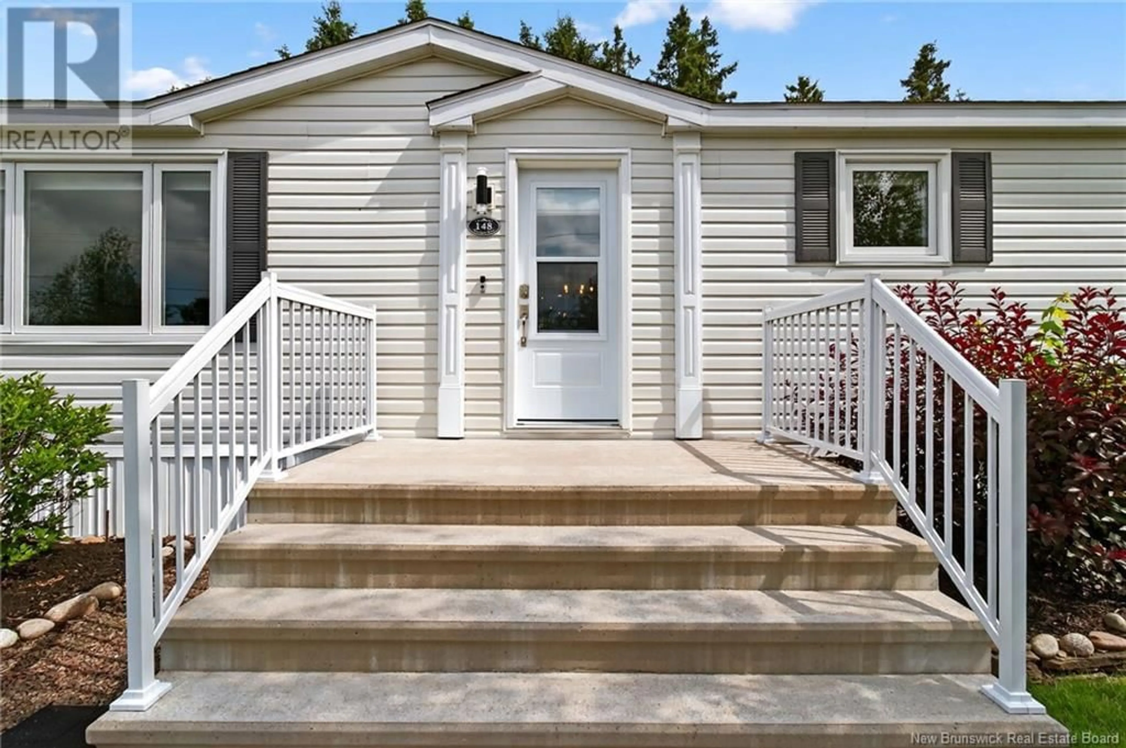 Home with vinyl exterior material, street for 148 NEPISIGUIT DRIVE, Dieppe New Brunswick E1A7N1