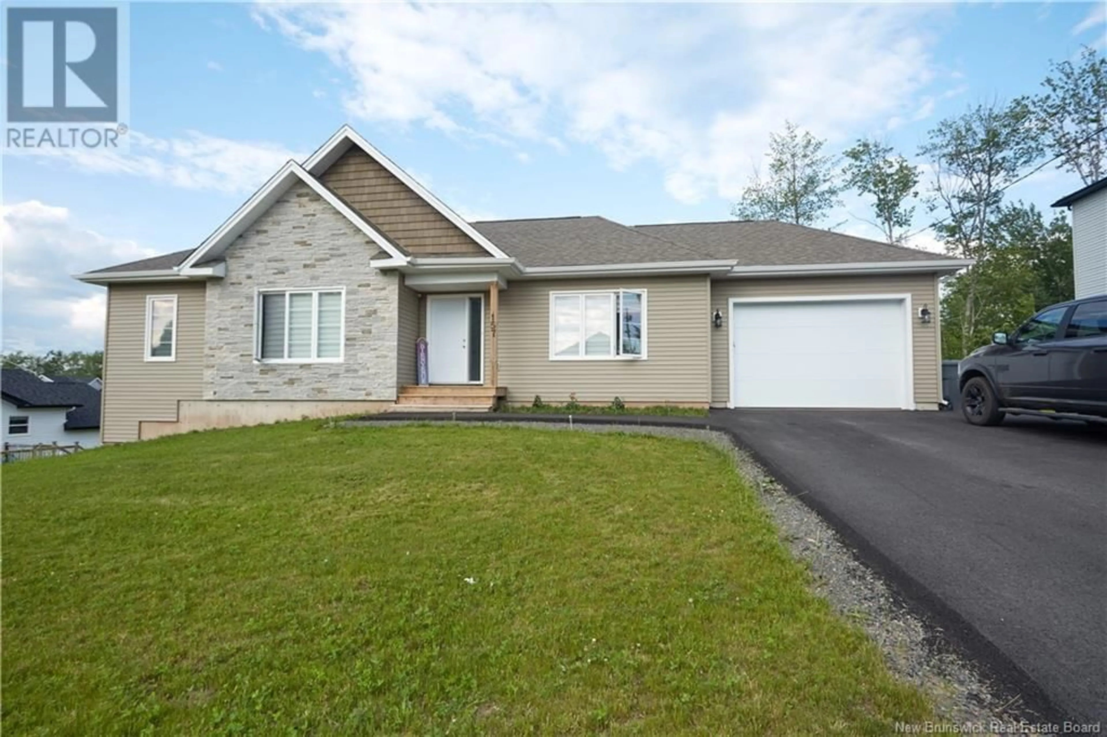 Home with vinyl exterior material, street for 157 RIPPLEWOOD ROAD, Moncton New Brunswick E1A6T4