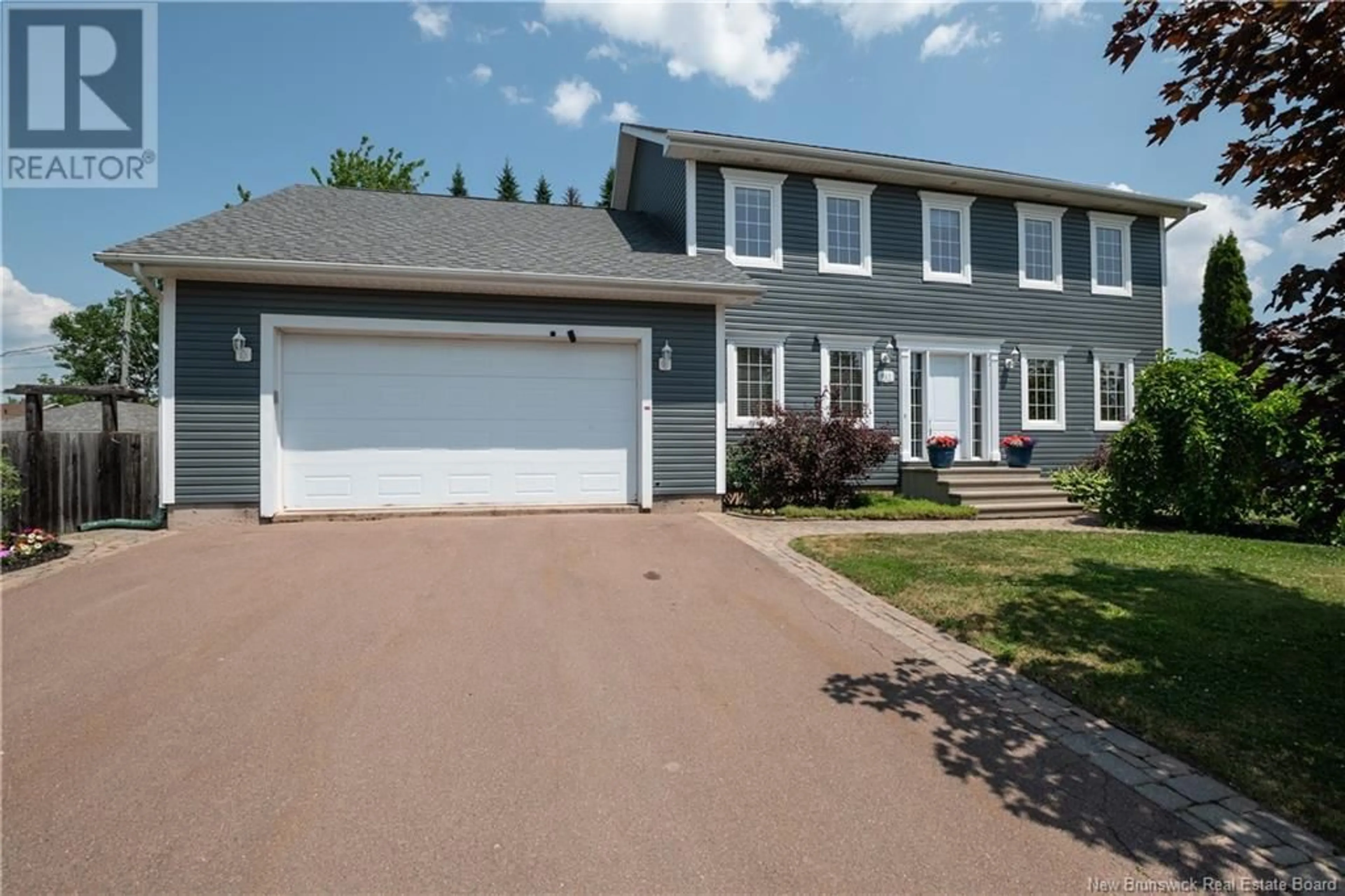 Home with vinyl exterior material, street for 917 MUIRFIELD, Moncton New Brunswick E1G3T9