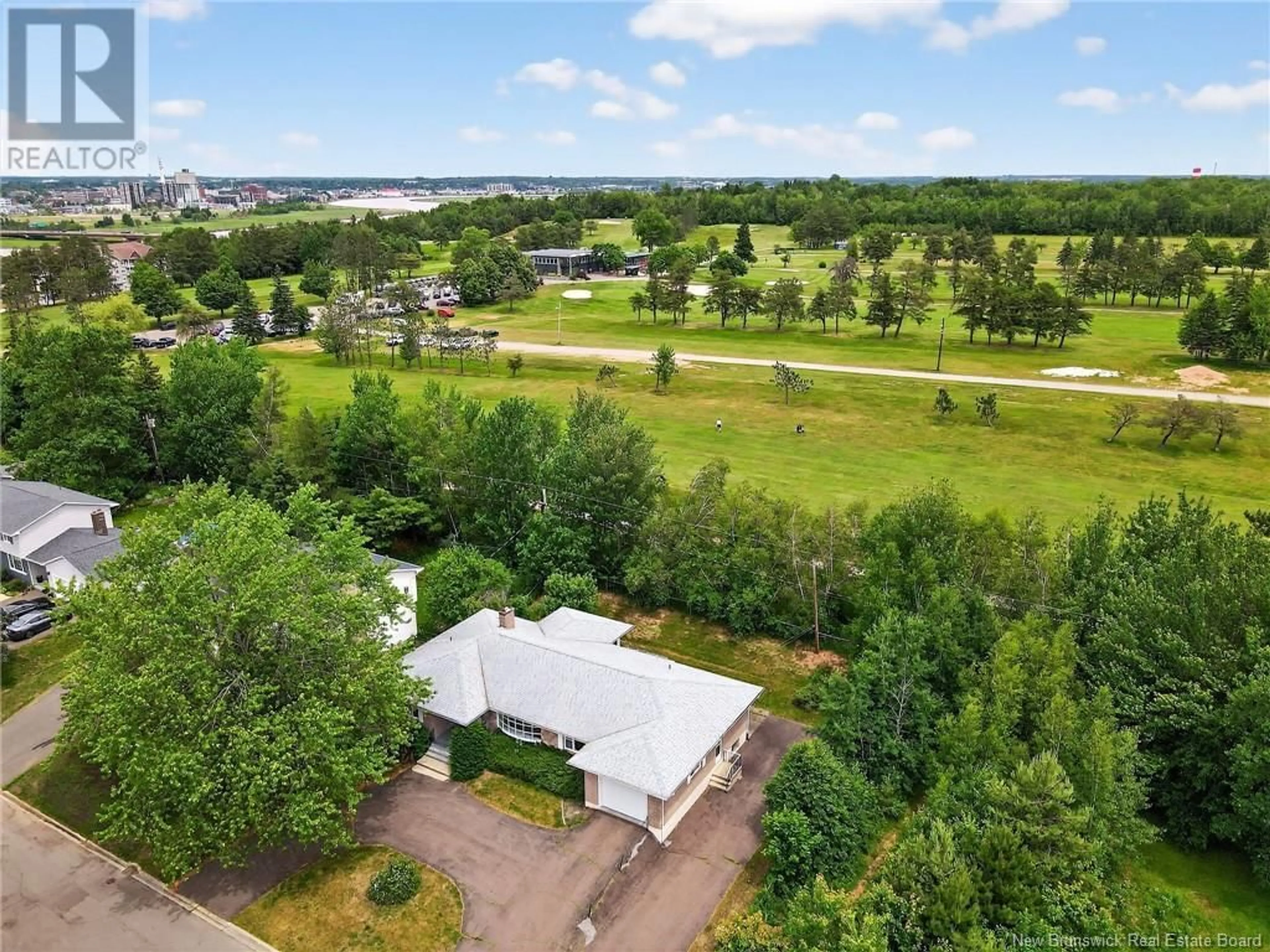 A pic from outside/outdoor area/front of a property/back of a property/a pic from drone, unknown for 26 FAIRWAY BOULEVARD, Riverview New Brunswick E1B1S8