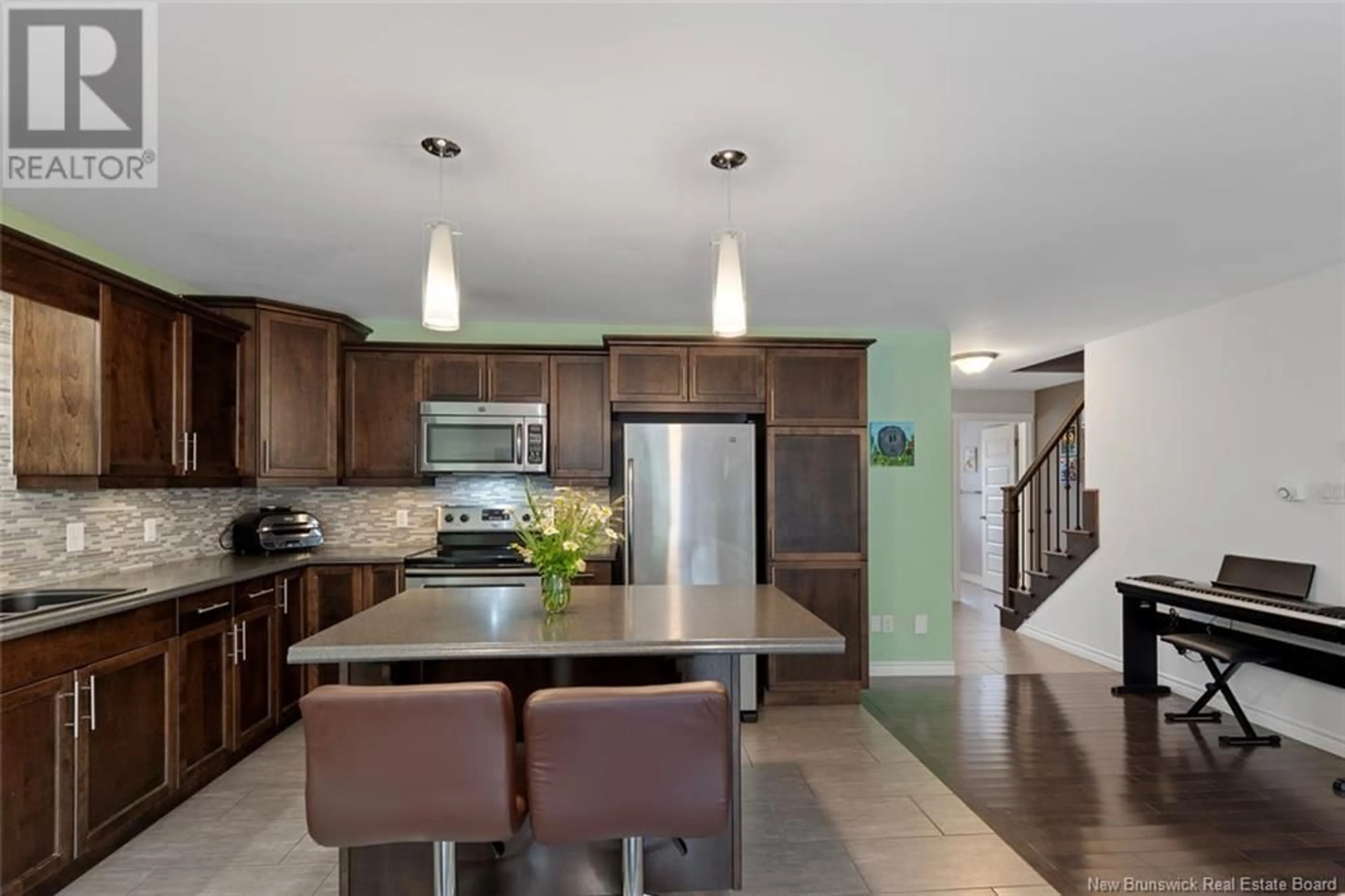 Open concept kitchen, ceramic/tile floor for 351 DOLBEAU STREET, Dieppe New Brunswick E1A4H8