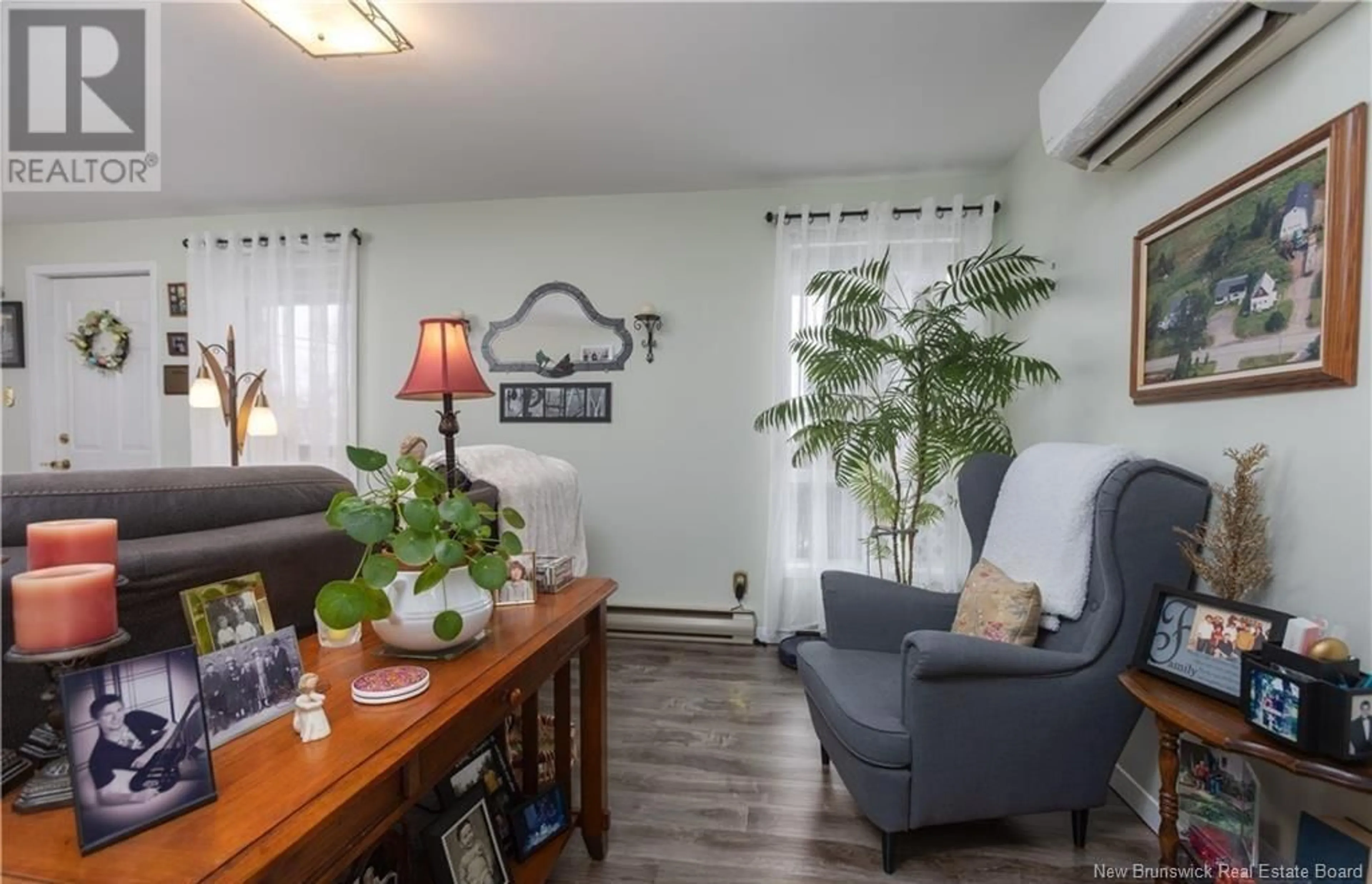 Living room with furniture, wood/laminate floor for 5320 ROUTE 114, Hopewell Hill New Brunswick E4H3N2
