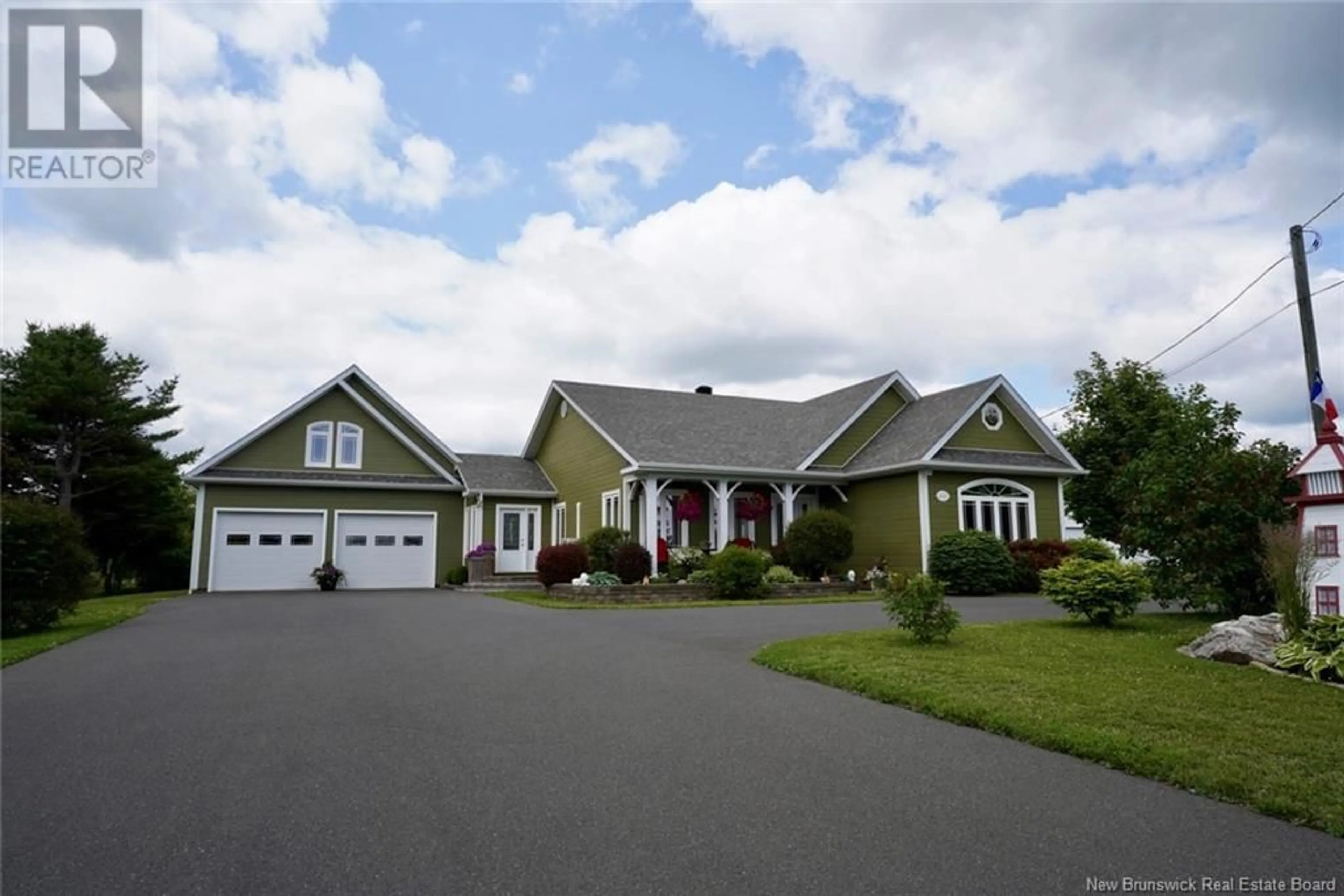 Home with vinyl exterior material, street for 426 DE LA BAIE STREET, Nigadoo New Brunswick E8K3P7