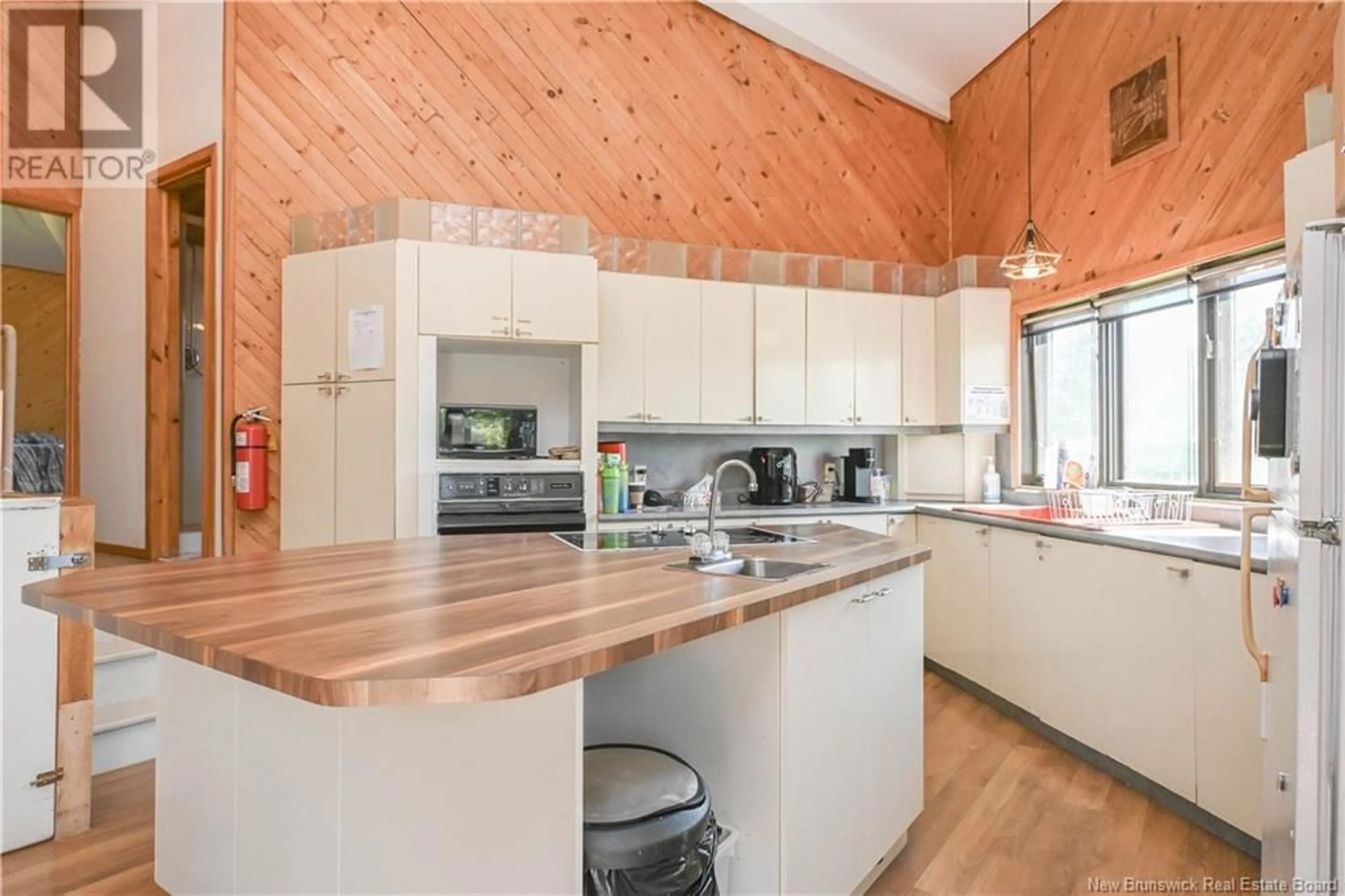 Open concept kitchen, wood/laminate floor for 703 113 ROUTE ROUTE, Inkerman New Brunswick E8P1B3