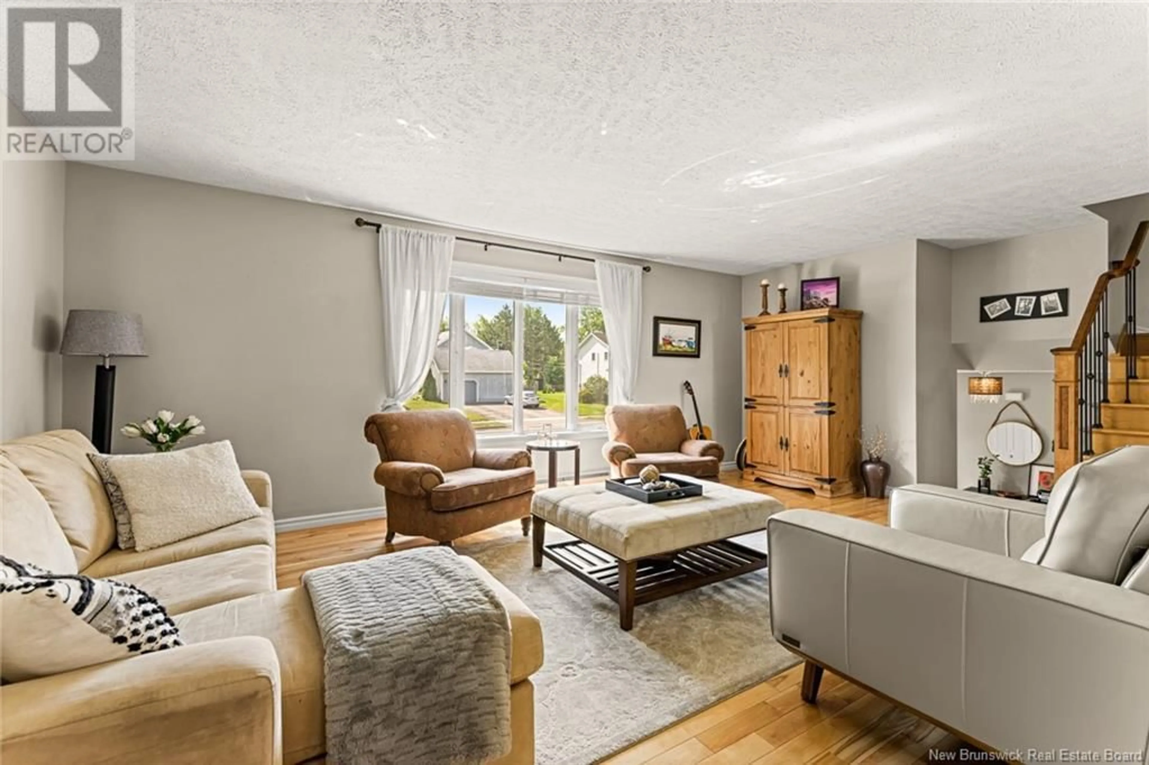 Living room with furniture, unknown for 143 WHITE OAK TERRACE, Moncton New Brunswick E1G2E5