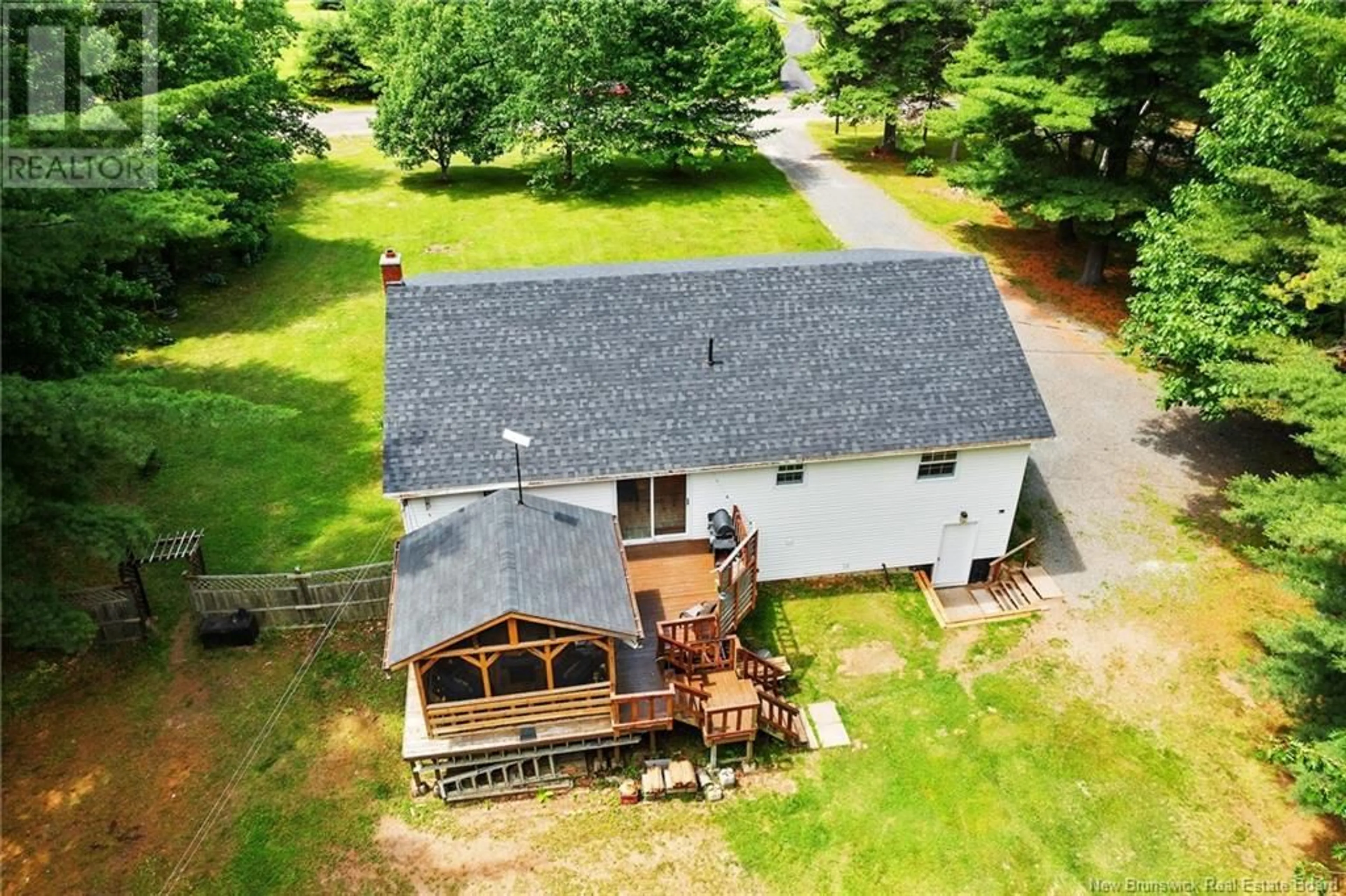 A pic from outside/outdoor area/front of a property/back of a property/a pic from drone, unknown for 8 MOORE CRESCENT, Hoyt New Brunswick E5L2J8