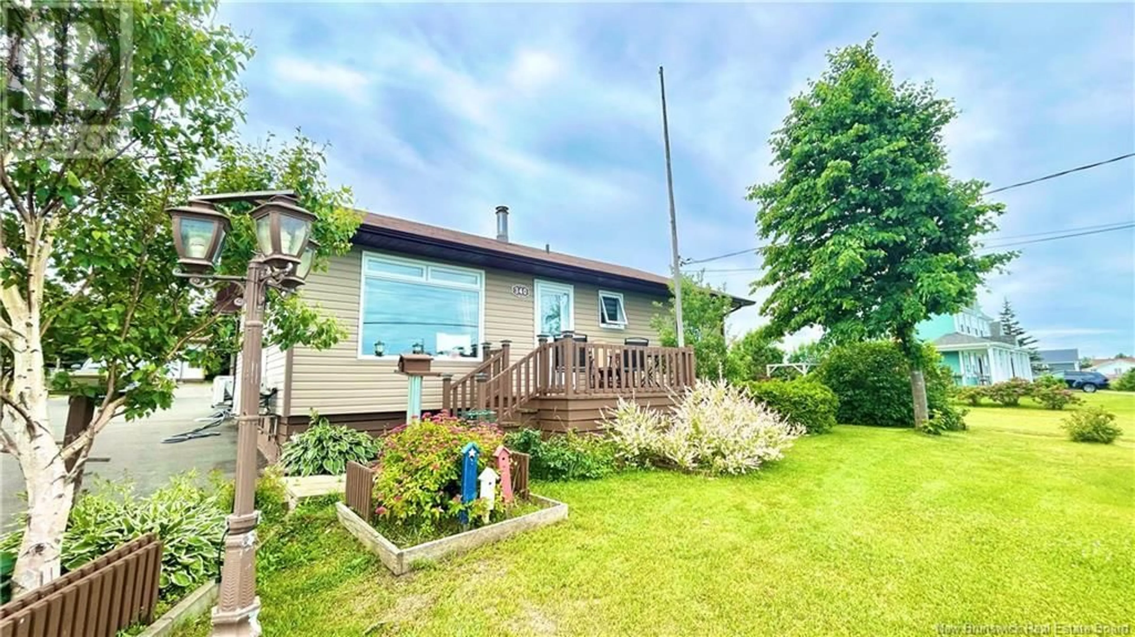 A pic from outside/outdoor area/front of a property/back of a property/a pic from drone, unknown for 340 DE L'ILE STREET, Caraquet New Brunswick E1W1B5