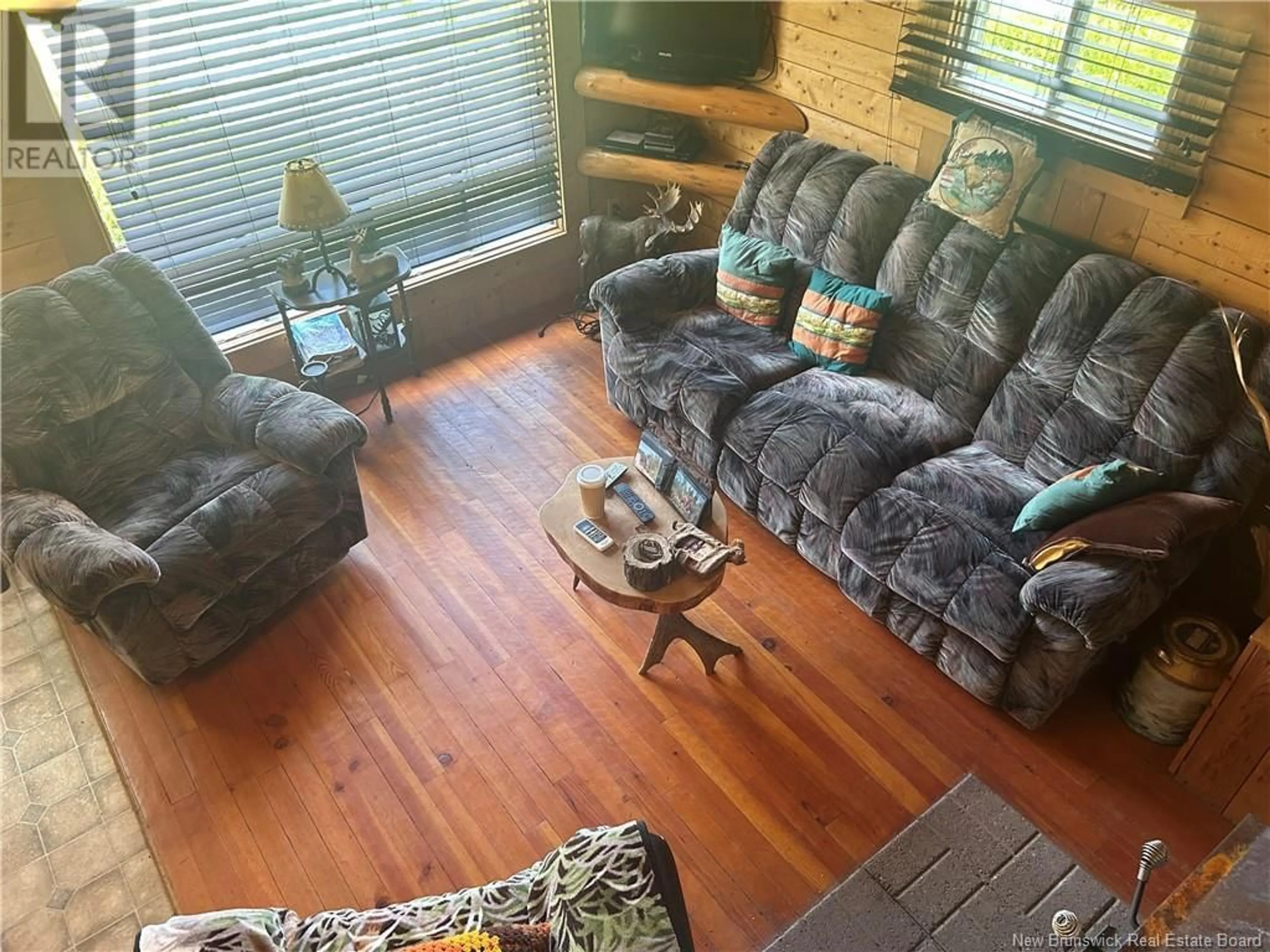 Living room with furniture, wood/laminate floor for 650 FORK STREAM RD, Hunters Home New Brunswick E4Z3A6