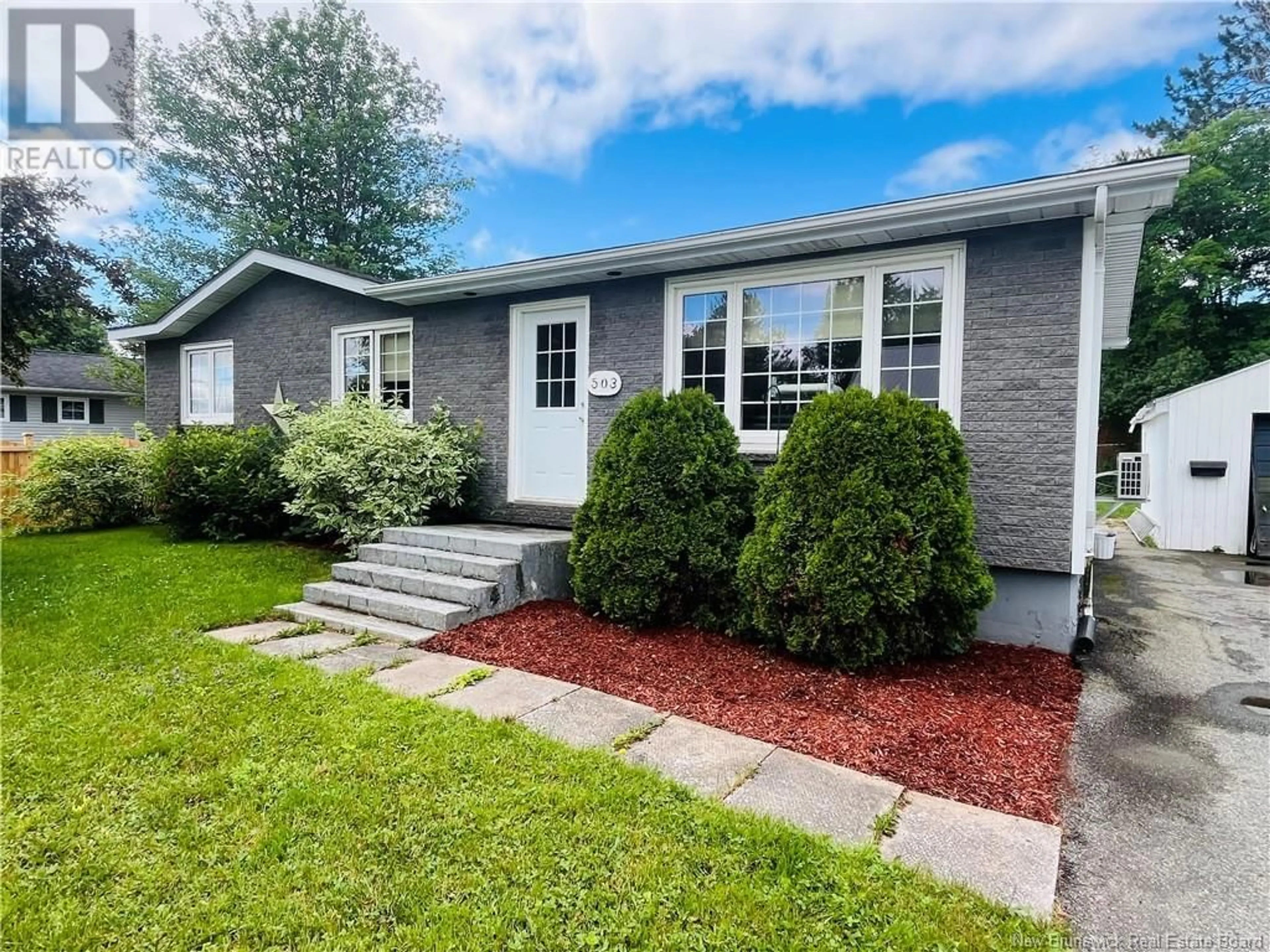 Home with vinyl exterior material, street for 503 MACMILLAN STREET, Miramichi New Brunswick E1V3R8
