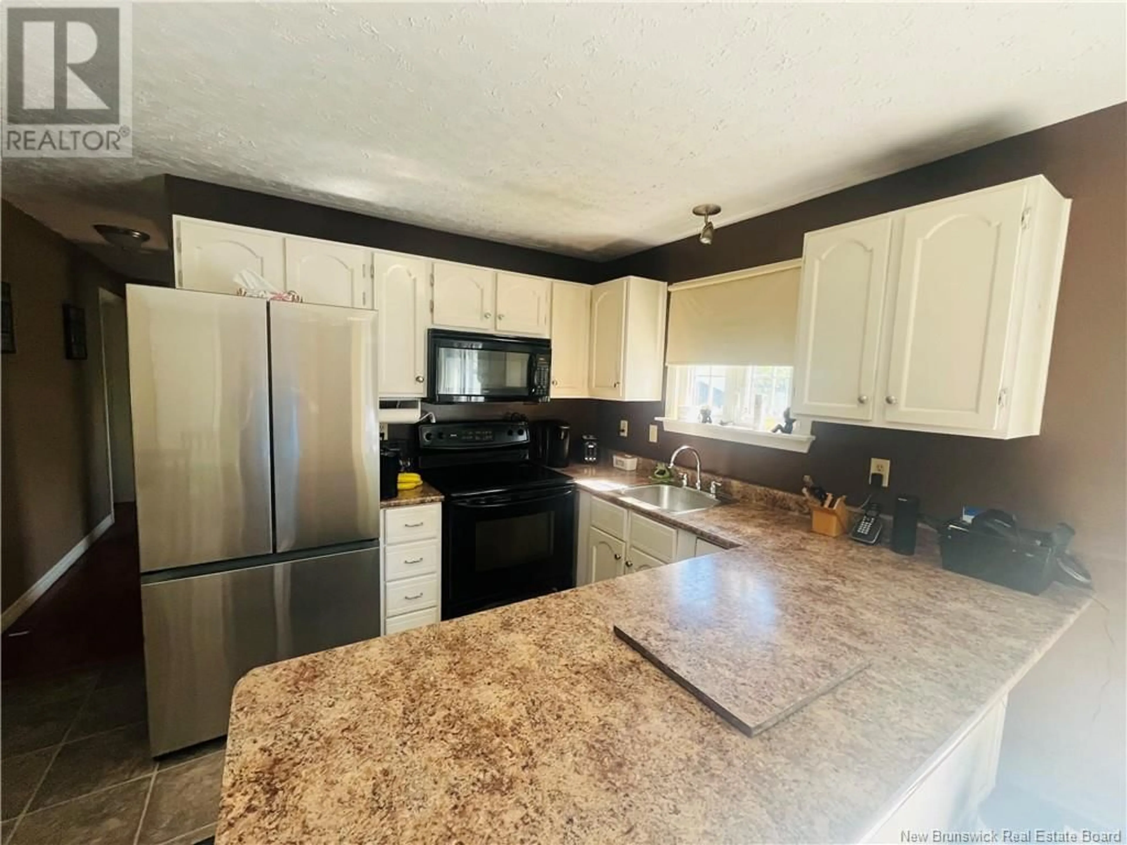 Open concept kitchen, ceramic/tile floor for 503 MACMILLAN STREET, Miramichi New Brunswick E1V3R8