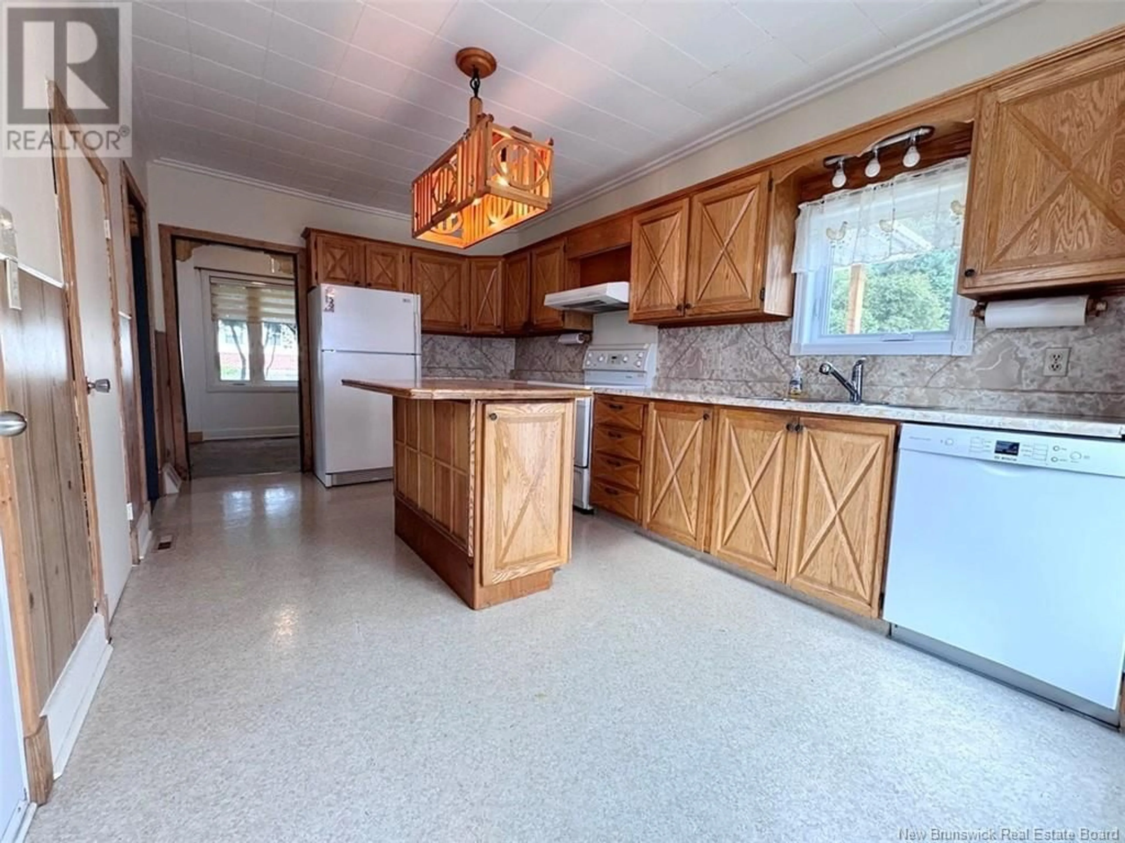 Open concept kitchen, ceramic/tile floor for 383 ST-FRANCOIS STREET, Edmundston New Brunswick E3V1G5