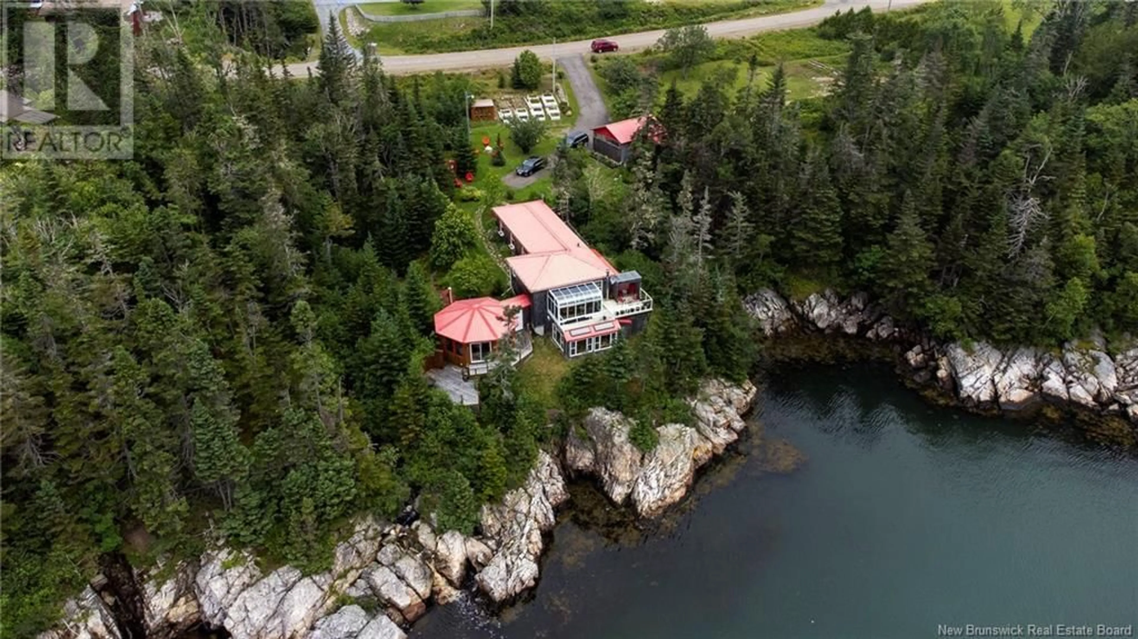 A pic from outside/outdoor area/front of a property/back of a property/a pic from drone, water/lake/river/ocean view for 1456 ROUTE 790, Dipper Harbour New Brunswick E5J1X9