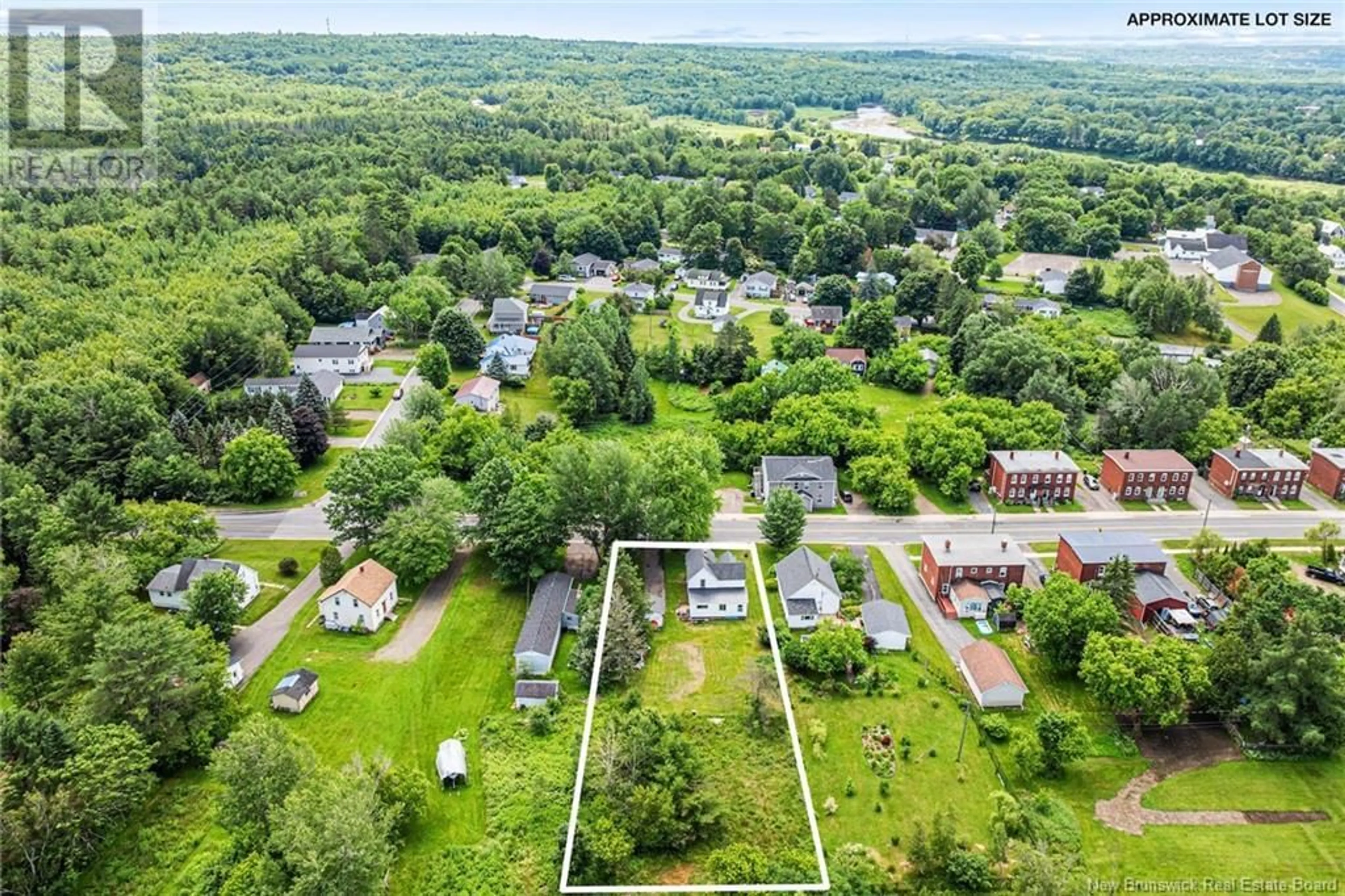 A pic from outside/outdoor area/front of a property/back of a property/a pic from drone, unknown for 71 BRIDGE STREET, Fredericton New Brunswick E3A4L4